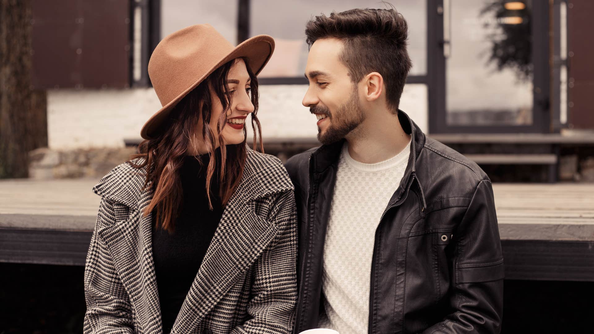 woman craving attention from man shes smiling at