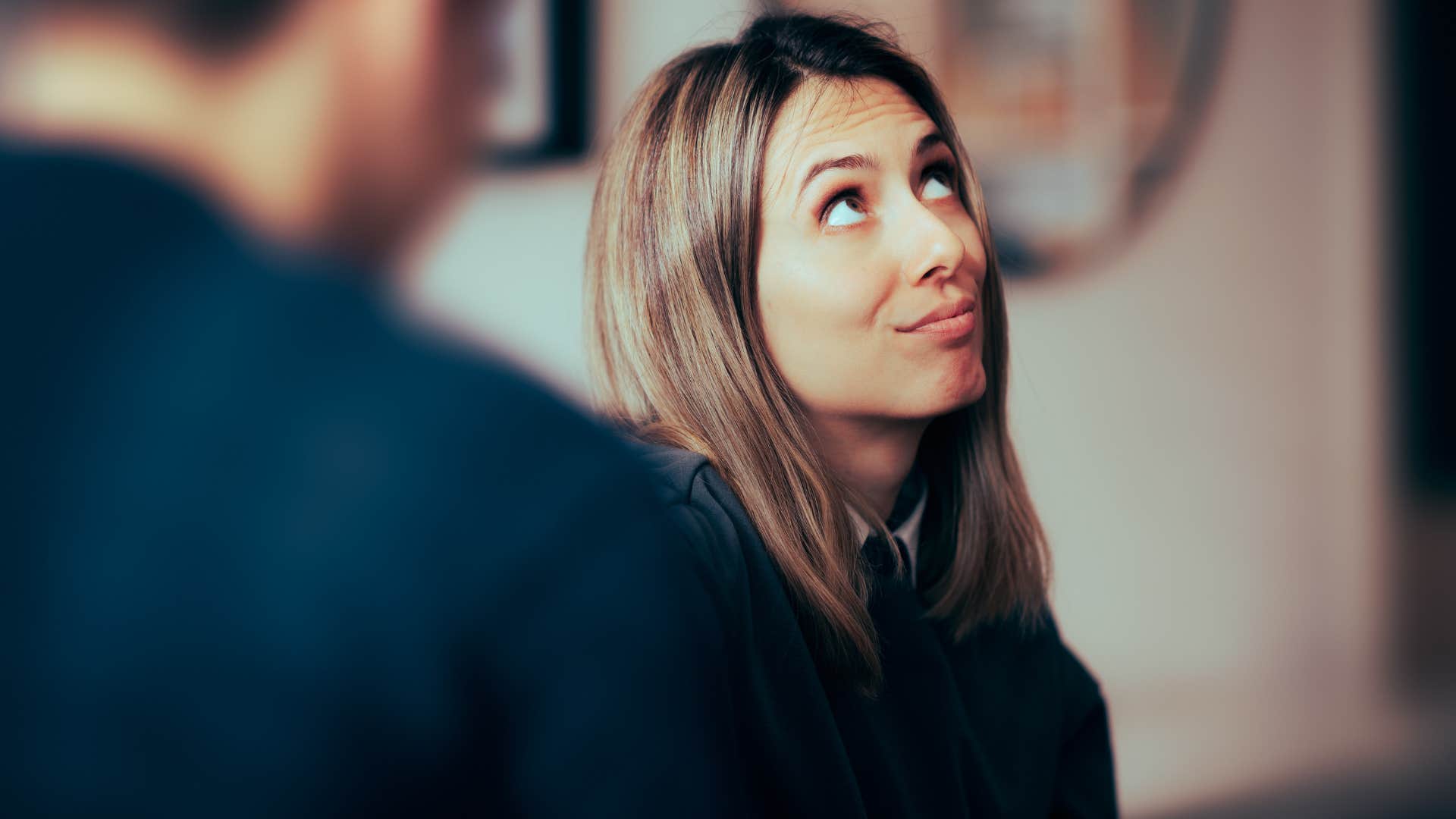 woman getting annoyed with partner talking
