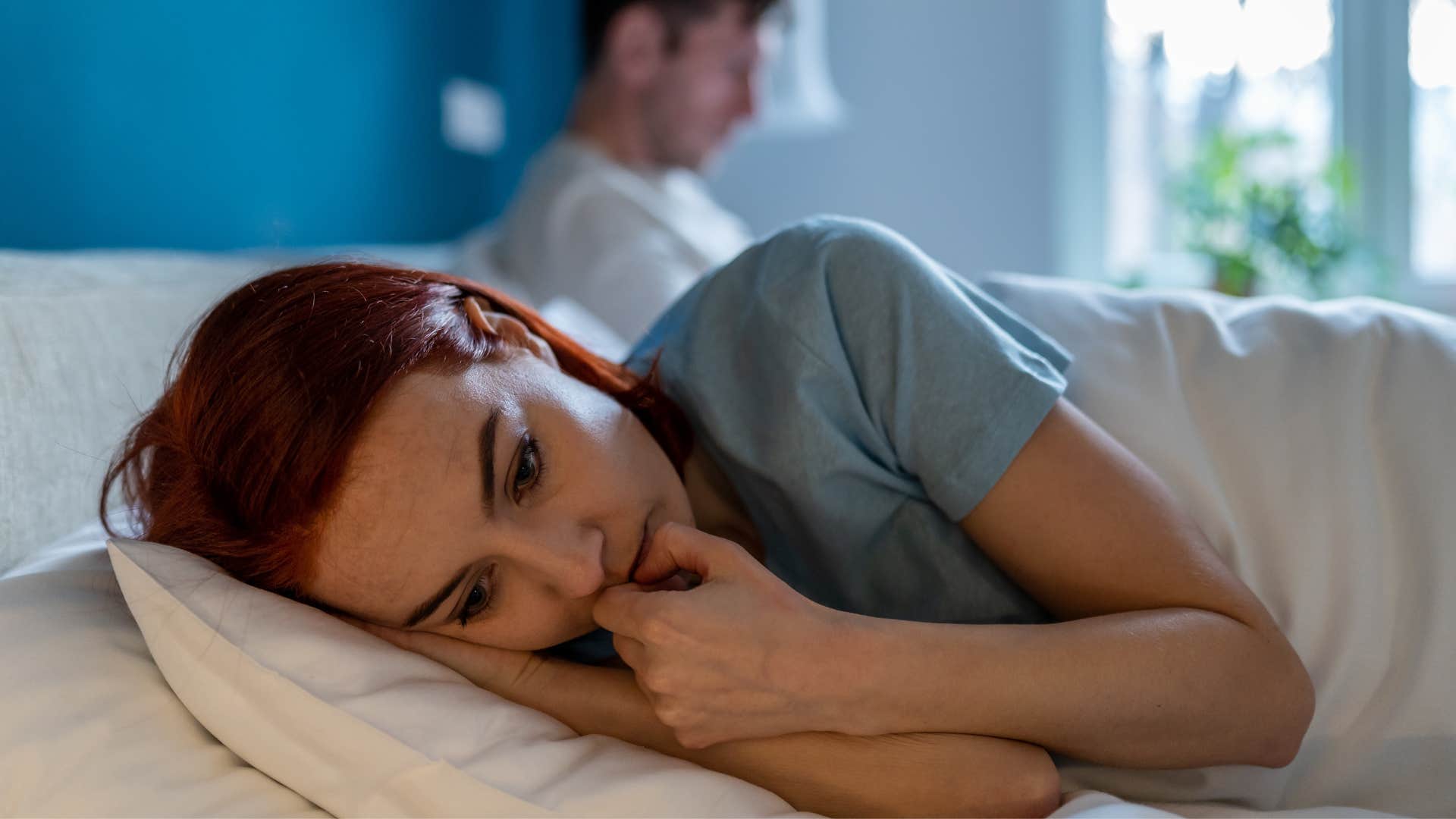 woman rejecting partner not wanting to be affectionate with him
