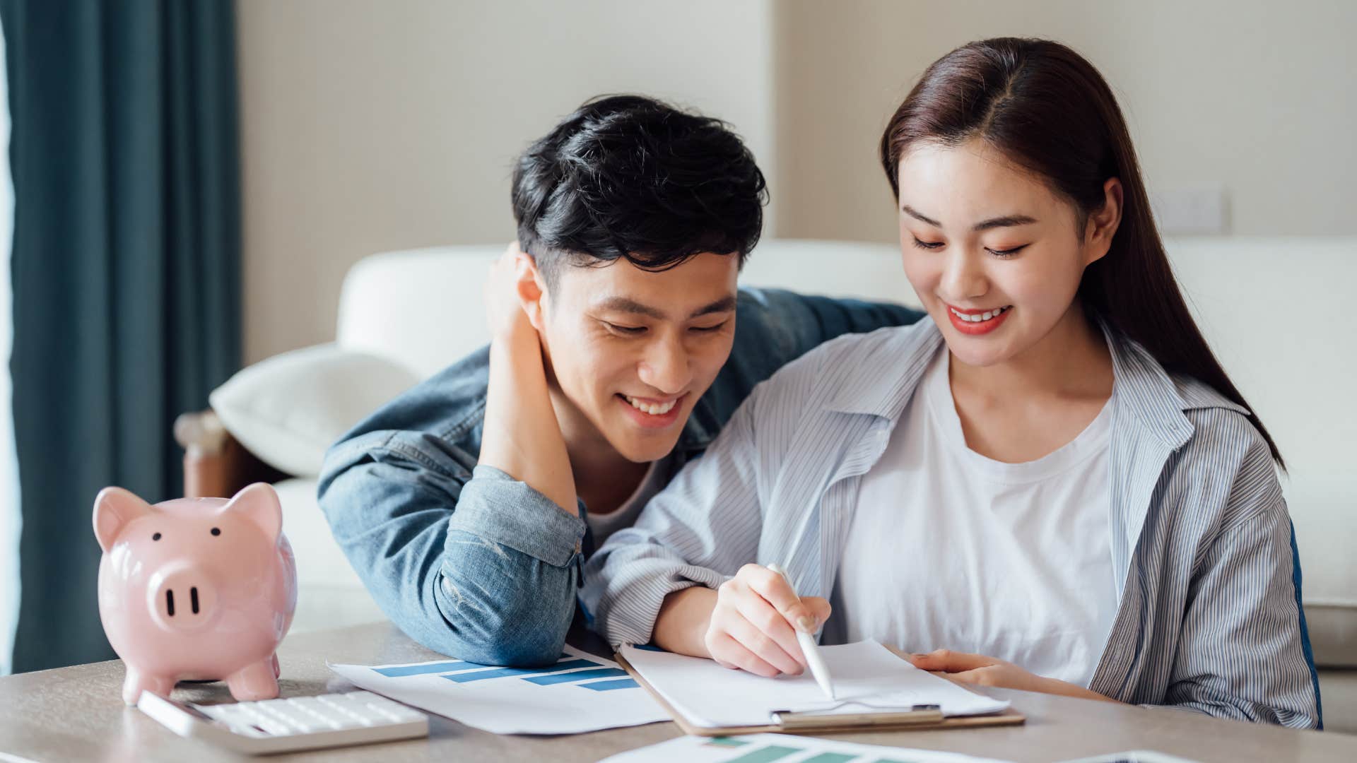 a man includes his girlfriend into his finances seeing a future with her