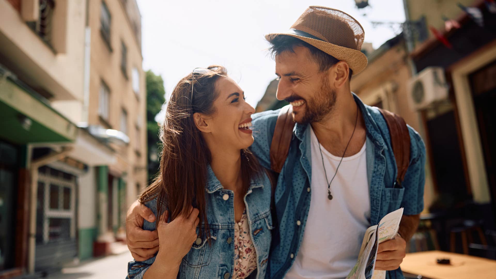 a man in love makes his partner feel safe as they travel together