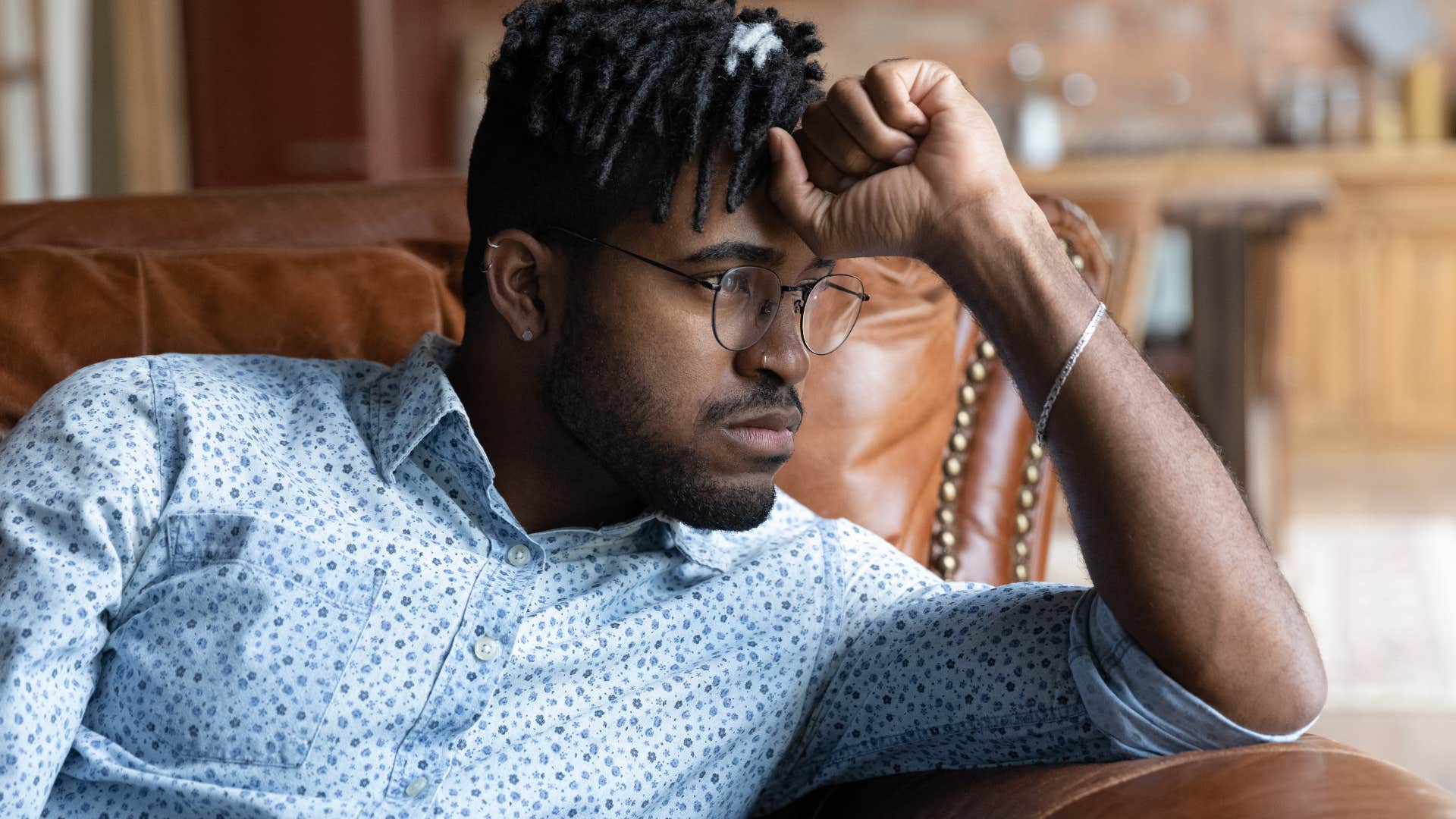 man with low self-esteem looking sad