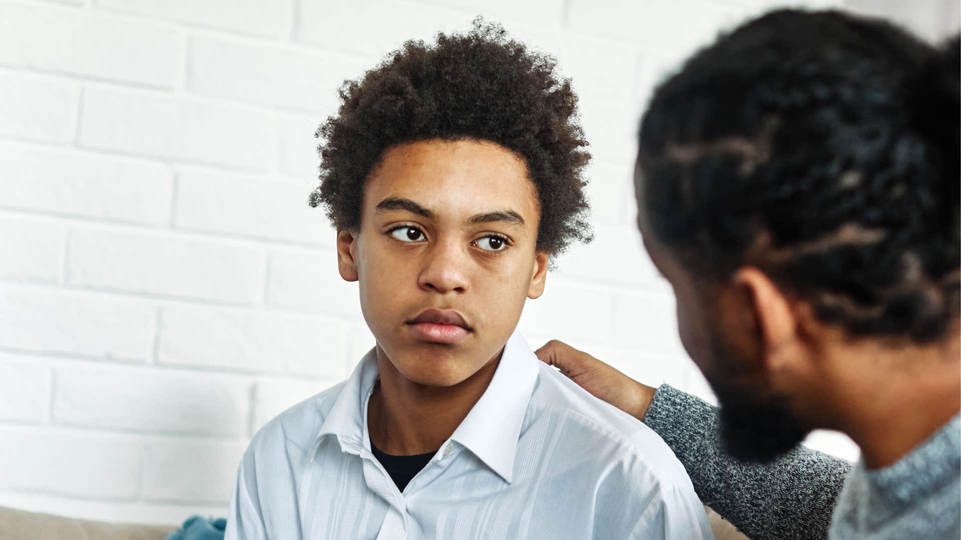 a son is upset with his father after he showed more kindness to others than him