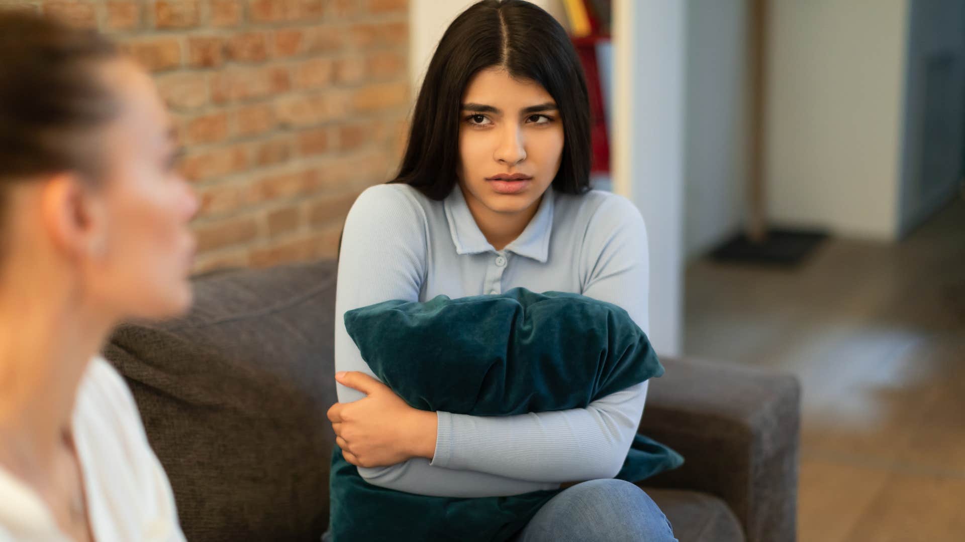 Upset teenage girl who didn't get to say "no" talking to her mom.