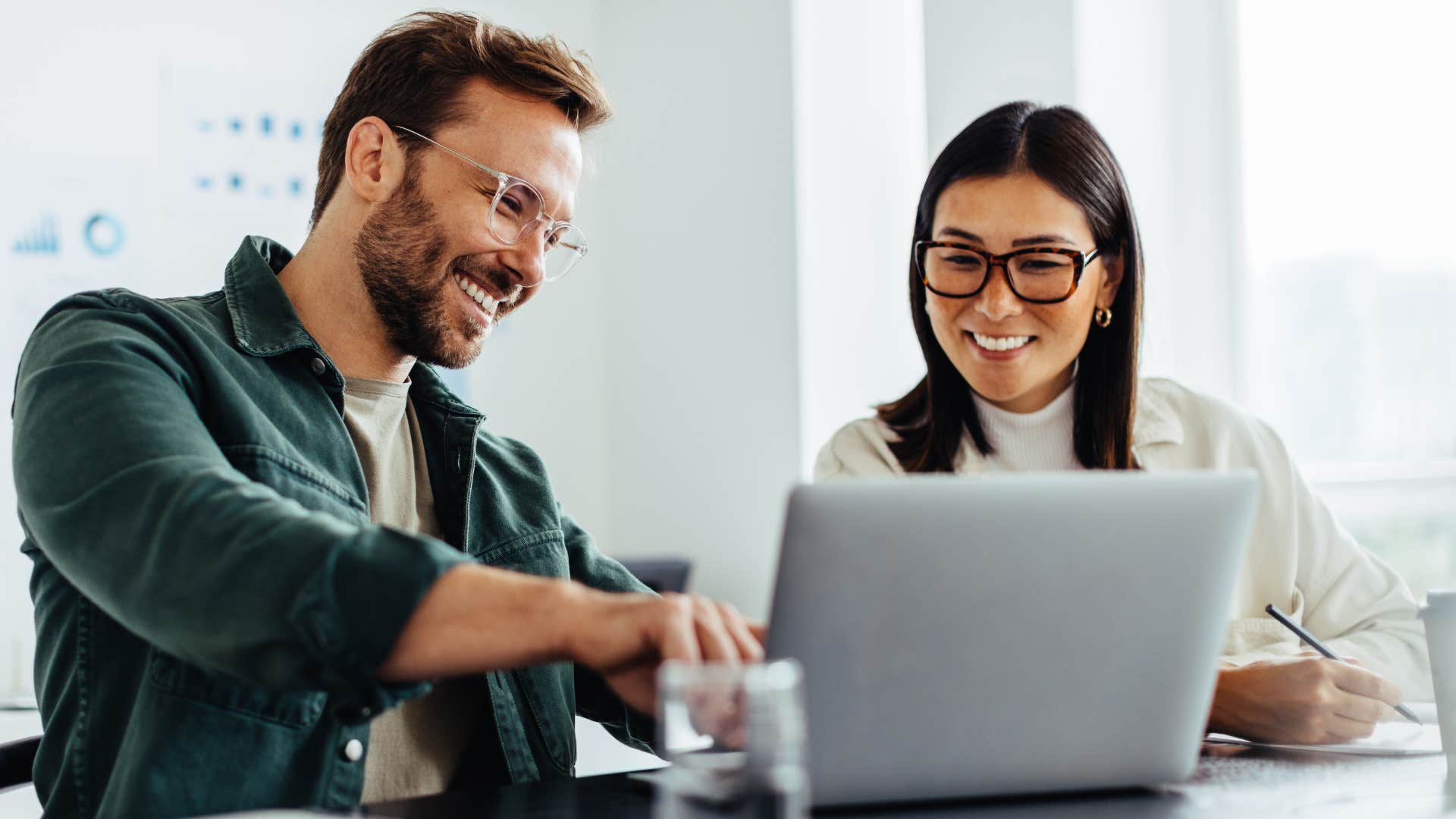 Man who's comfortable changing your mind talking to a co-worker.