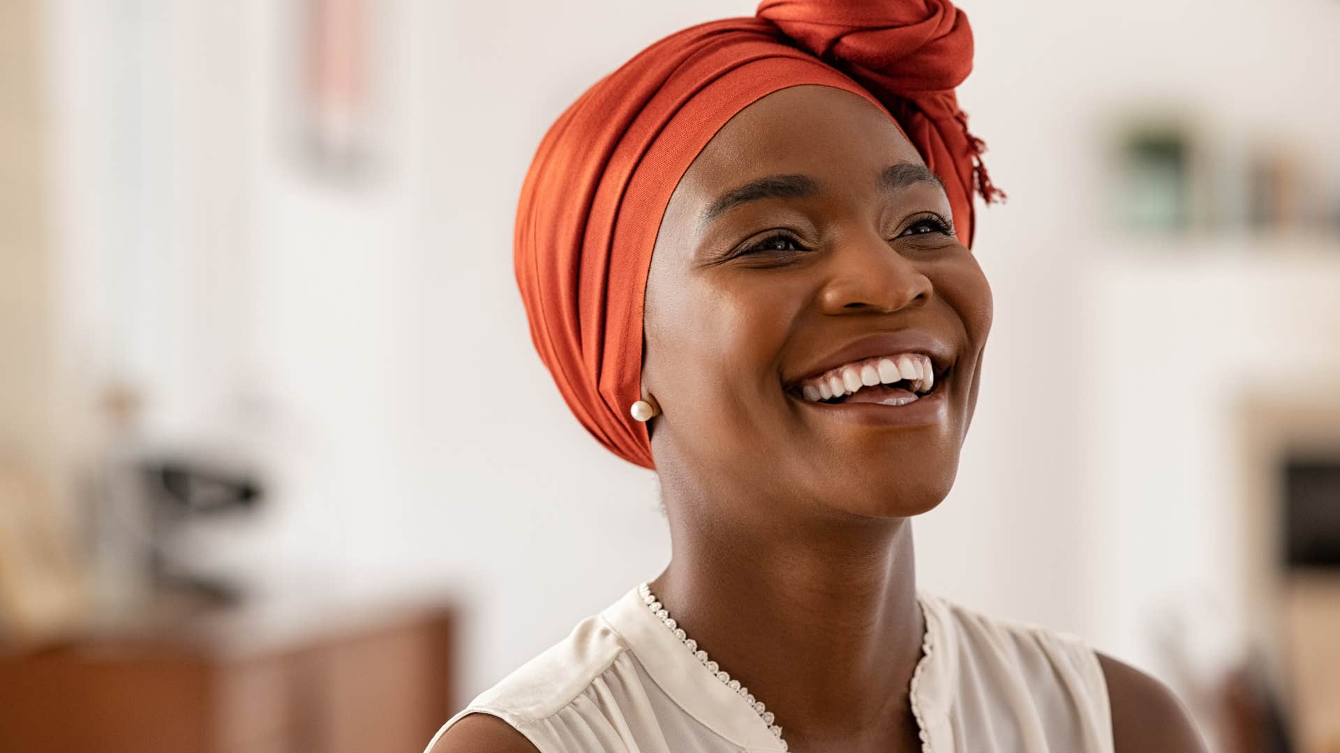Woman with strong personal values smiling at the camera.