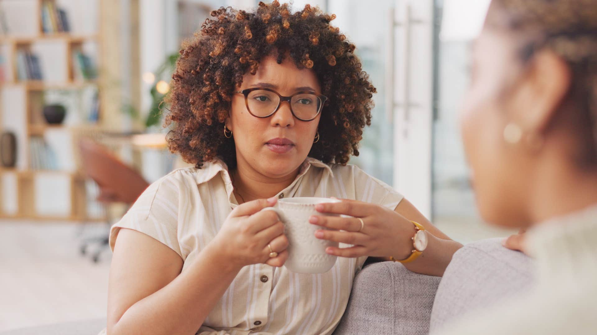 woman who never gets an apology looking at her friend