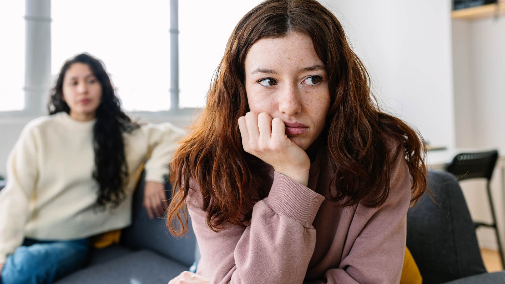 sad young woman second-guessing herself