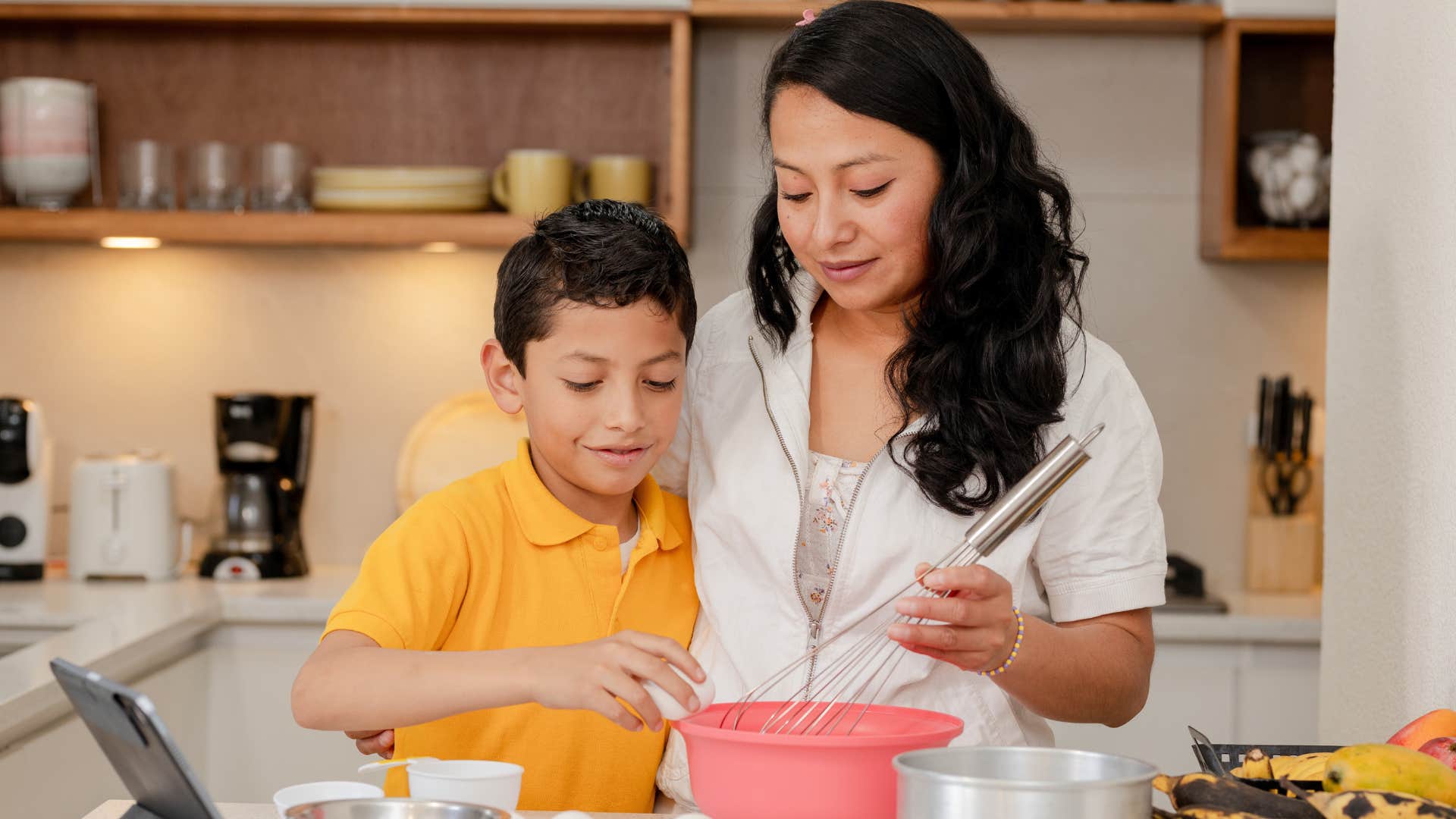 a mother bakes with her son instead of buying a cake