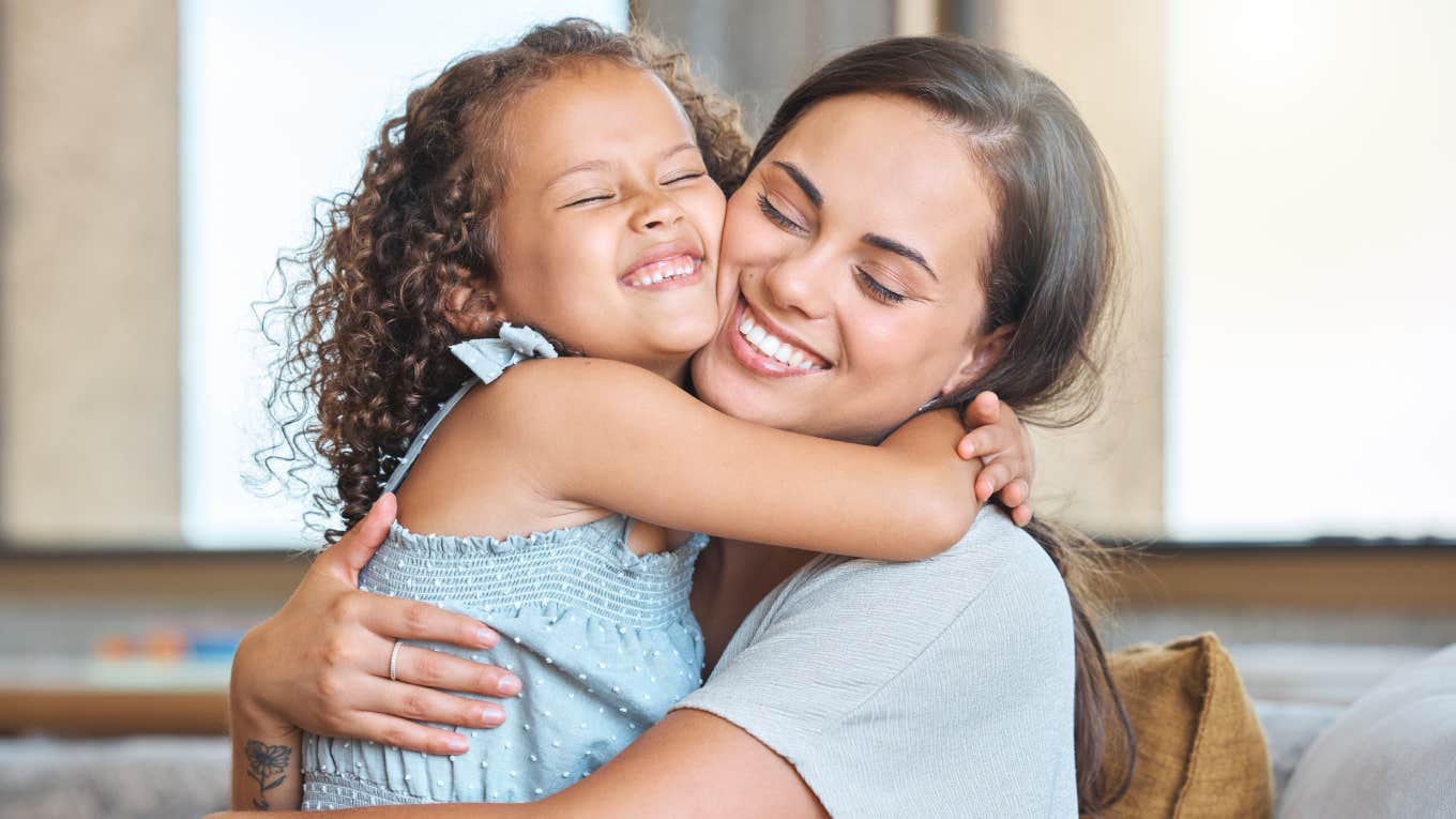 Single Mom Shares Comforting Mantra She Tells Her Daughter After Her Father Left Them mom hugging daughter