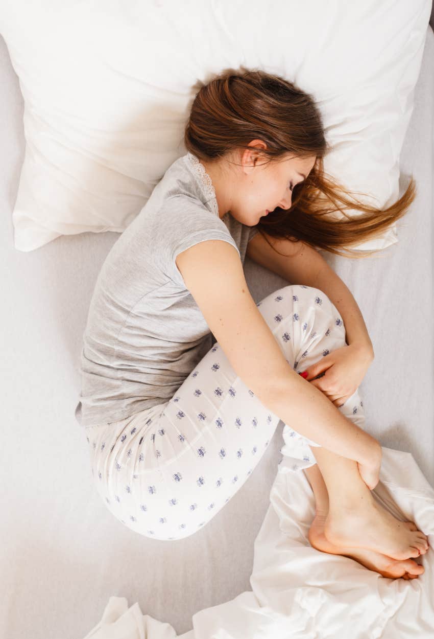 Woman sleeping in the fetal position and what it says about her personality