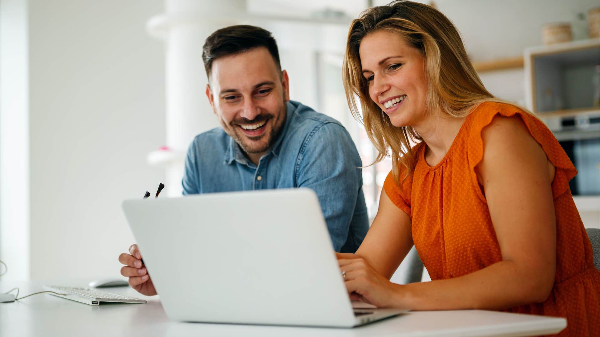 Woman who compromises easily smiling next to her husband.