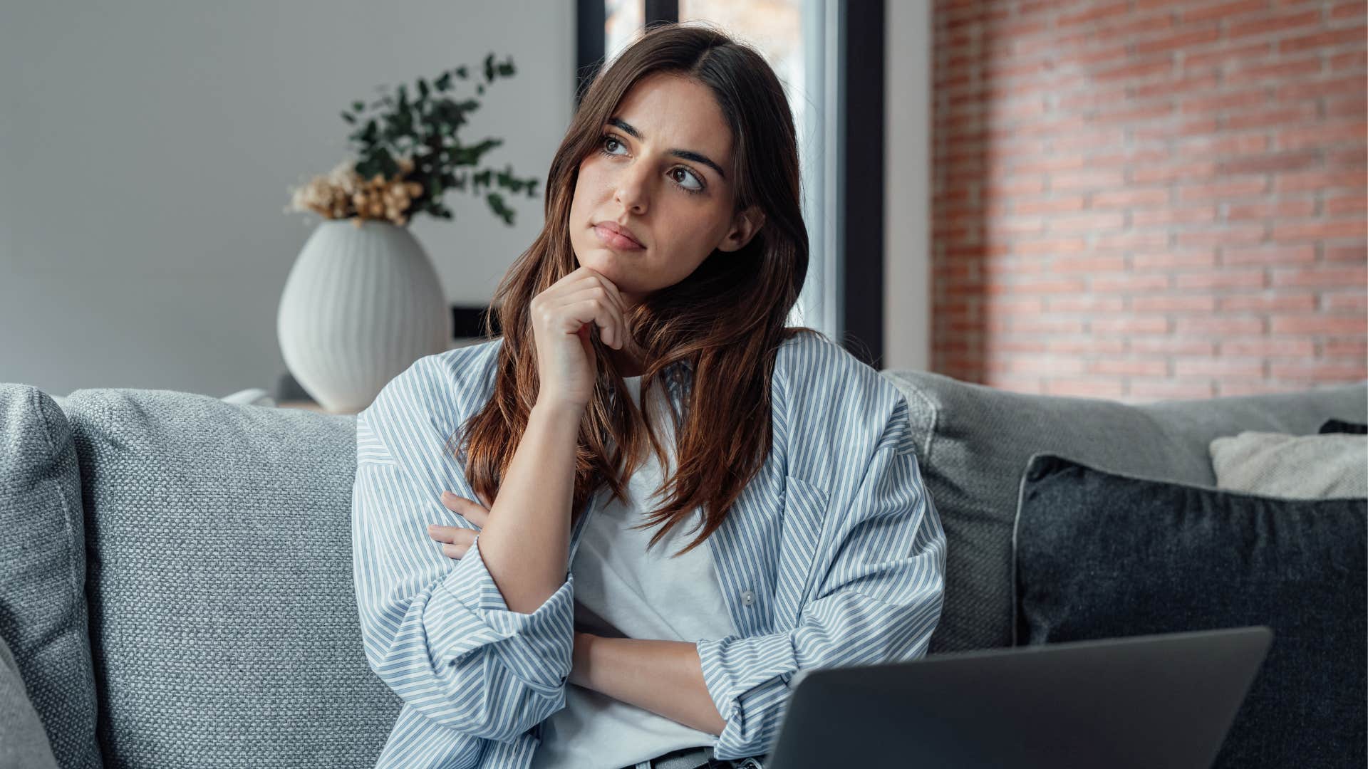 woman breaking free of people-pleasing by examining childhood experiences