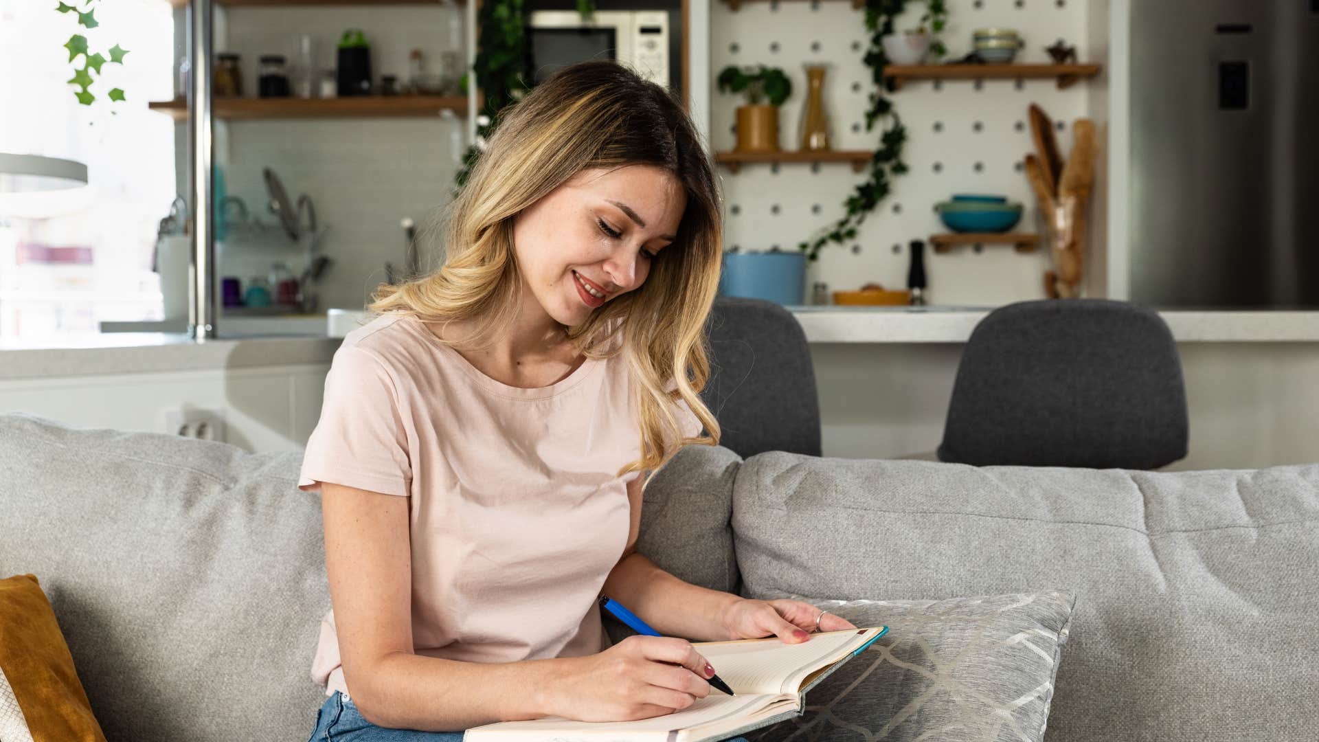 woman breaking free from people pleasing making a list