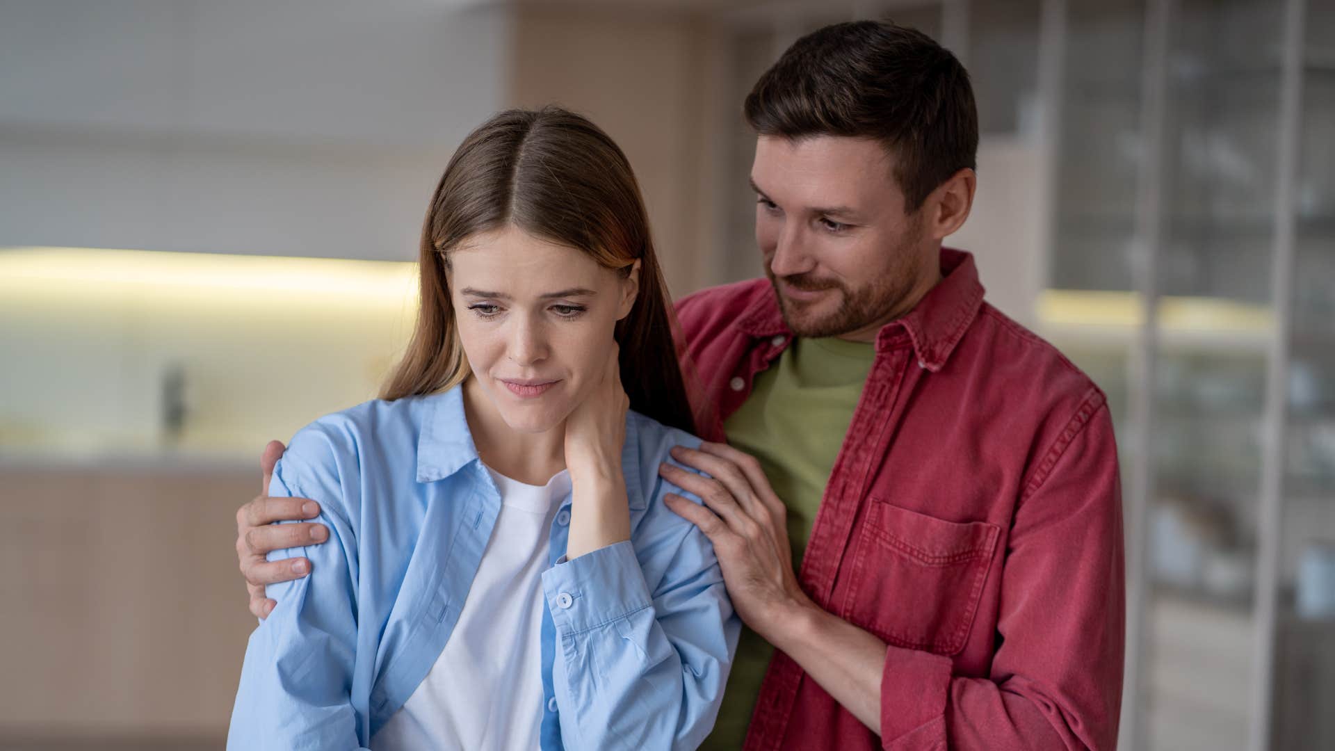 a man listens to his wife after she shows signs that she is upset