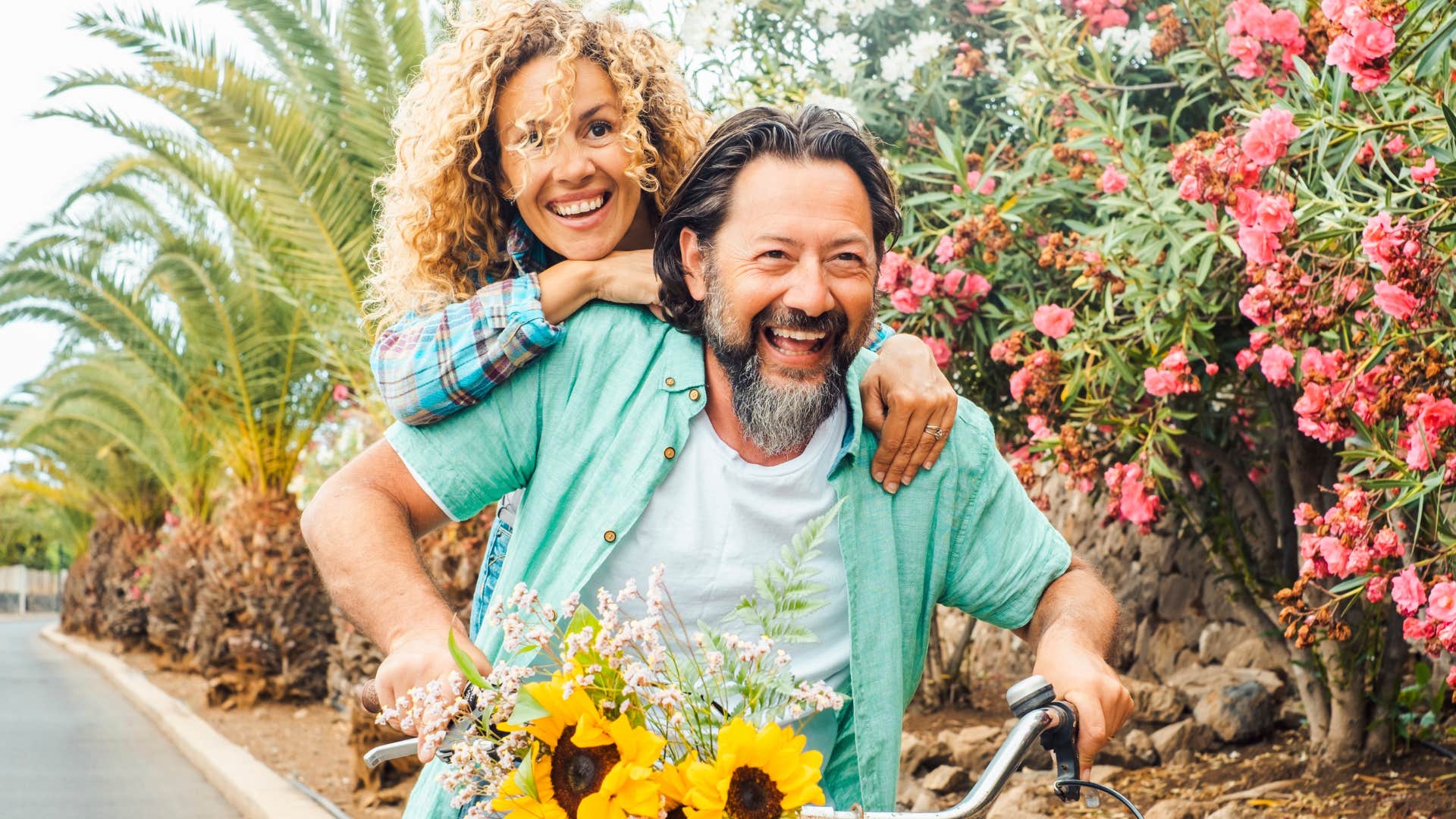 man trying new things his partner enjoys riding bike together