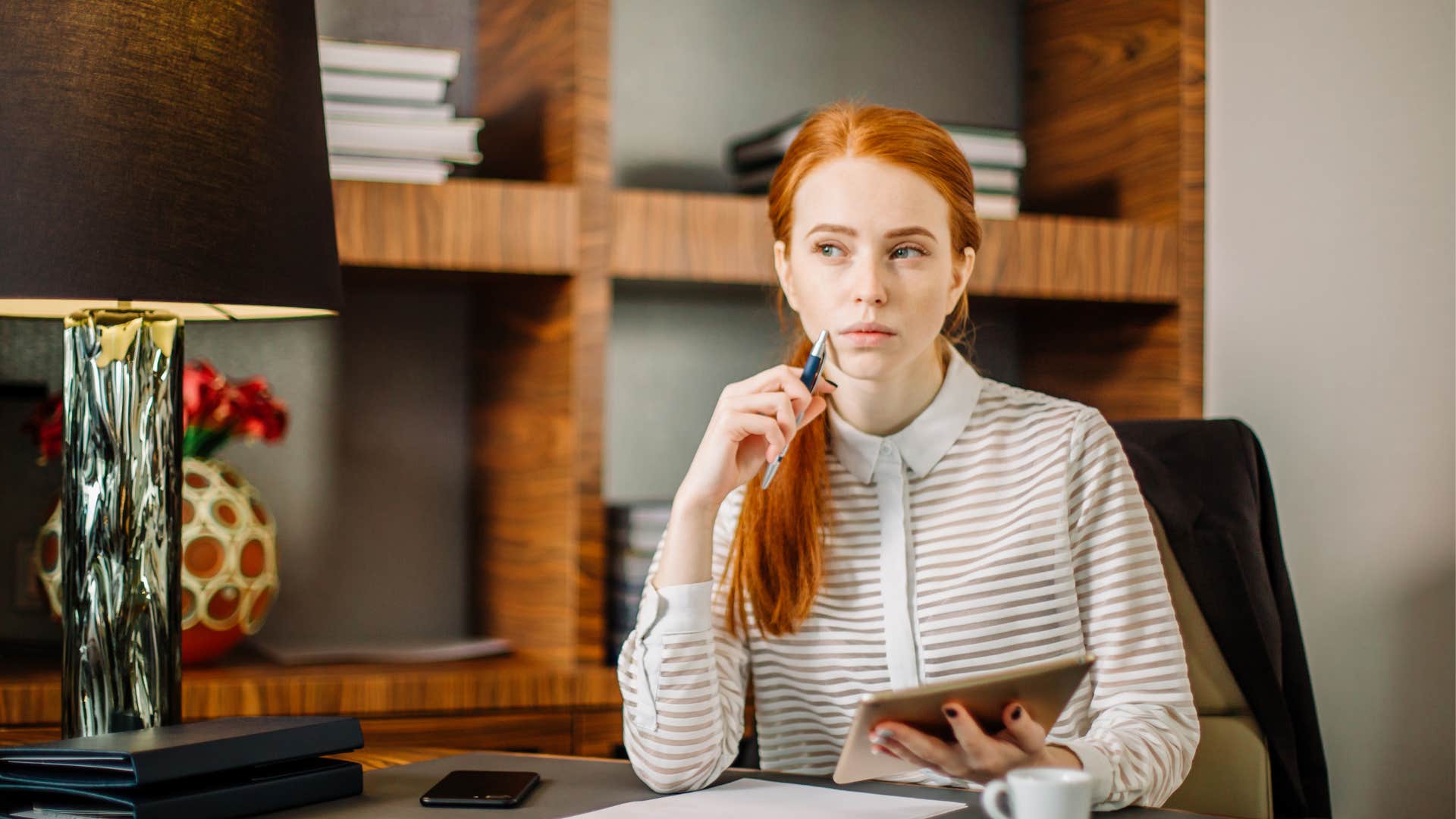 a woman does not justify the decisions she made at work