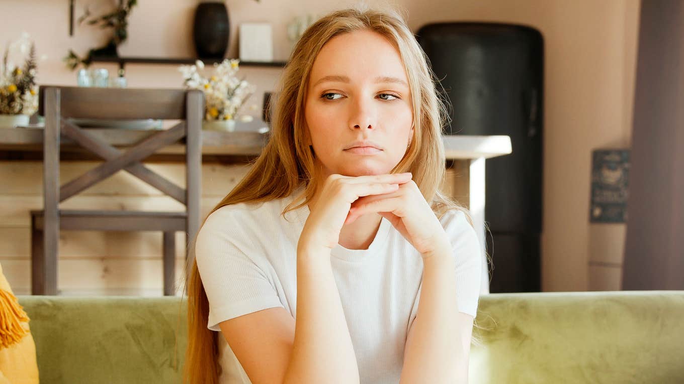 Small Ways You Can Tell Someone Grew Up Feeling Like A Burden sad young woman who feels like a burden