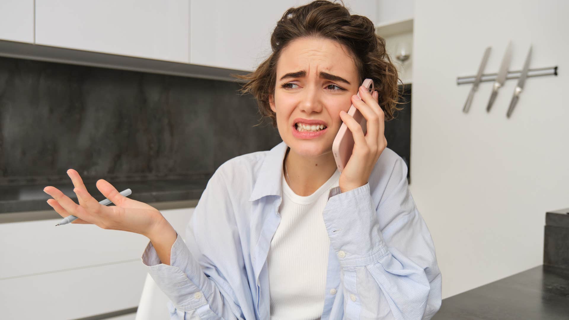 woman who apologizes often on the phone