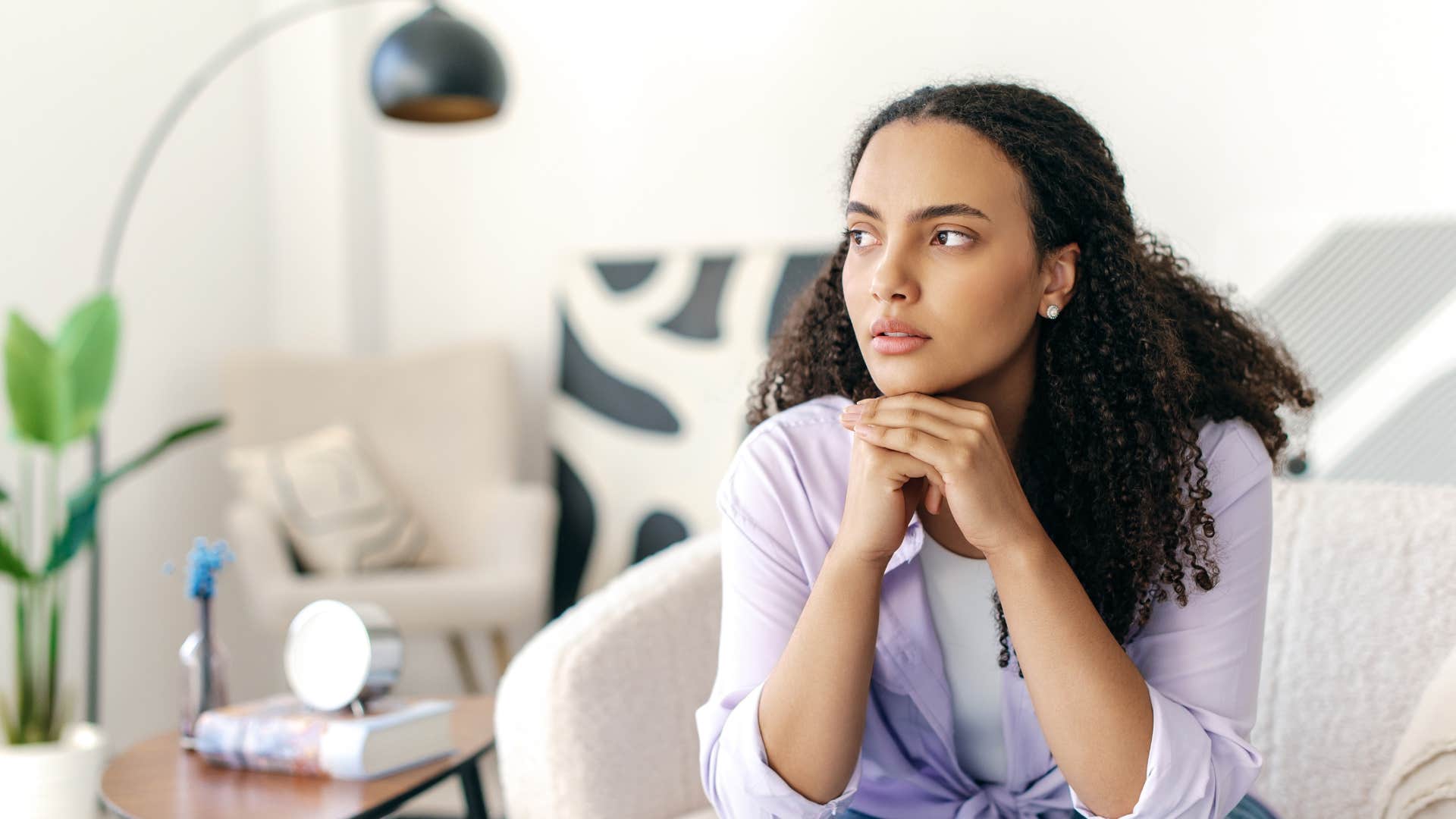 woman having a gut feeling something is wrong