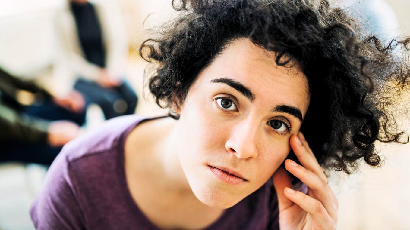 Subtle Clues Your Body Sends When You're Not As Healthy As You Think, According To Wellness Experts Woman's body sending her signs she's not as healthy as she thinks.