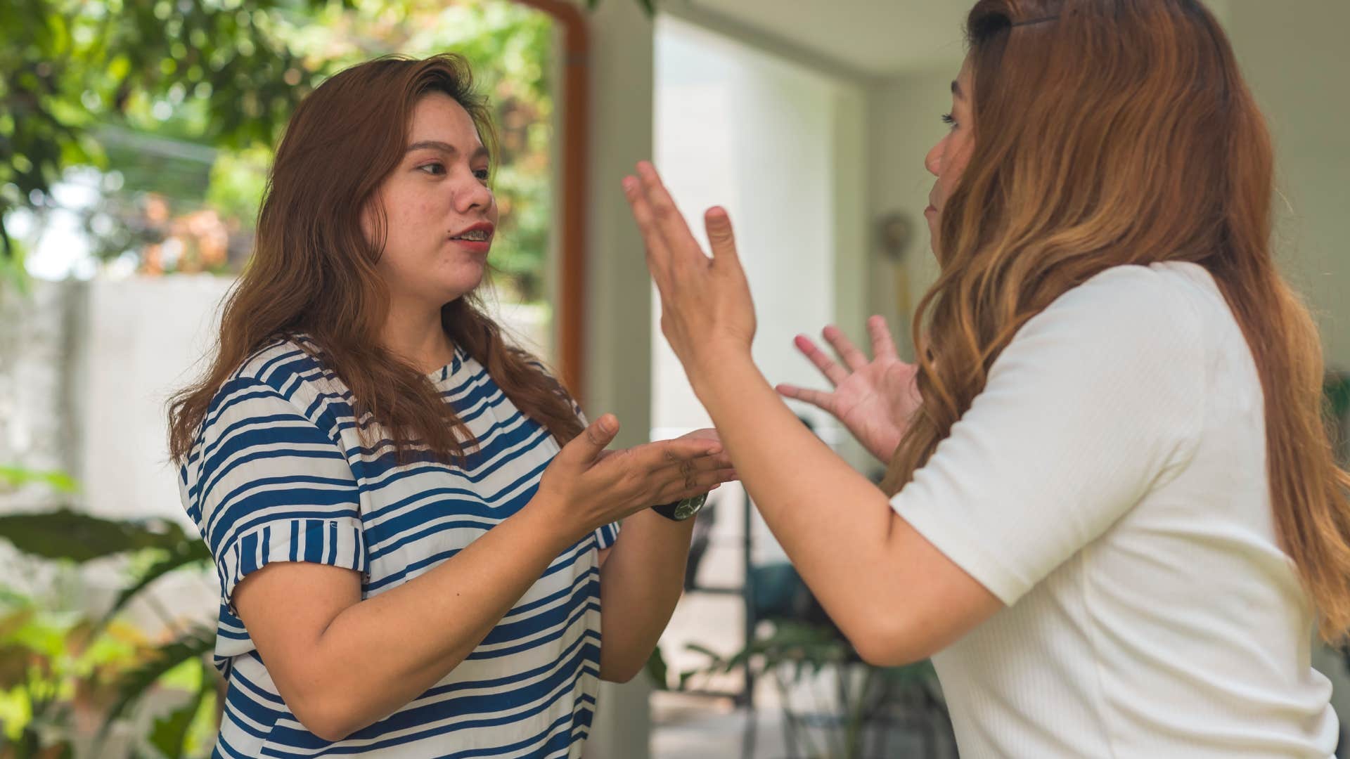 Woman downplaying accomplishments to her friend.