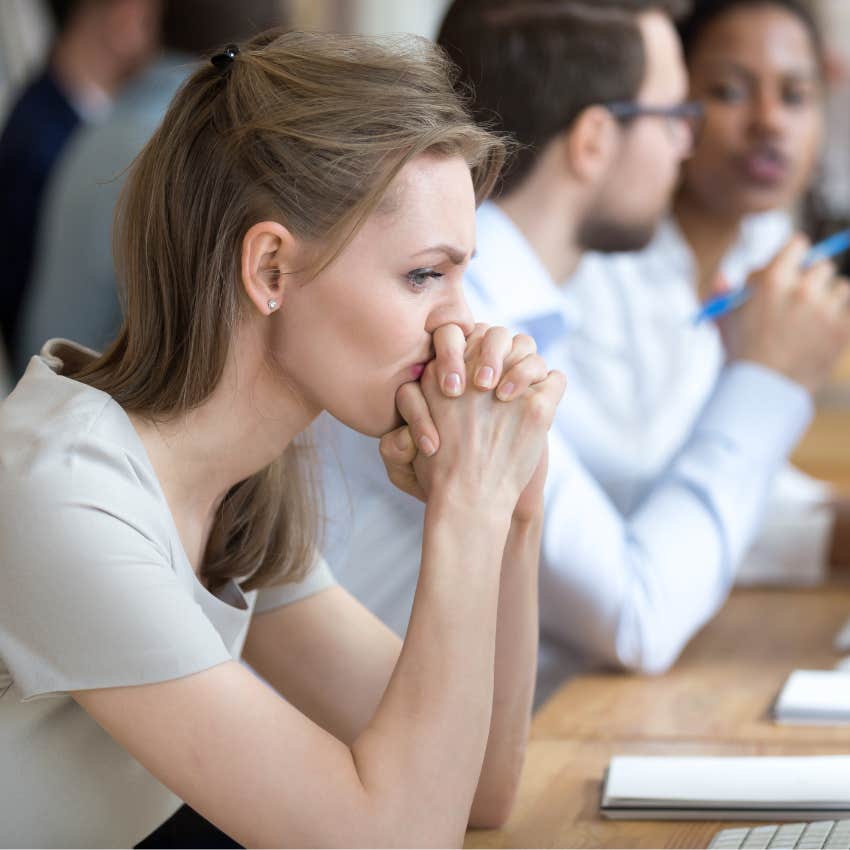 upset woman at work that didn't notice subtle red flag