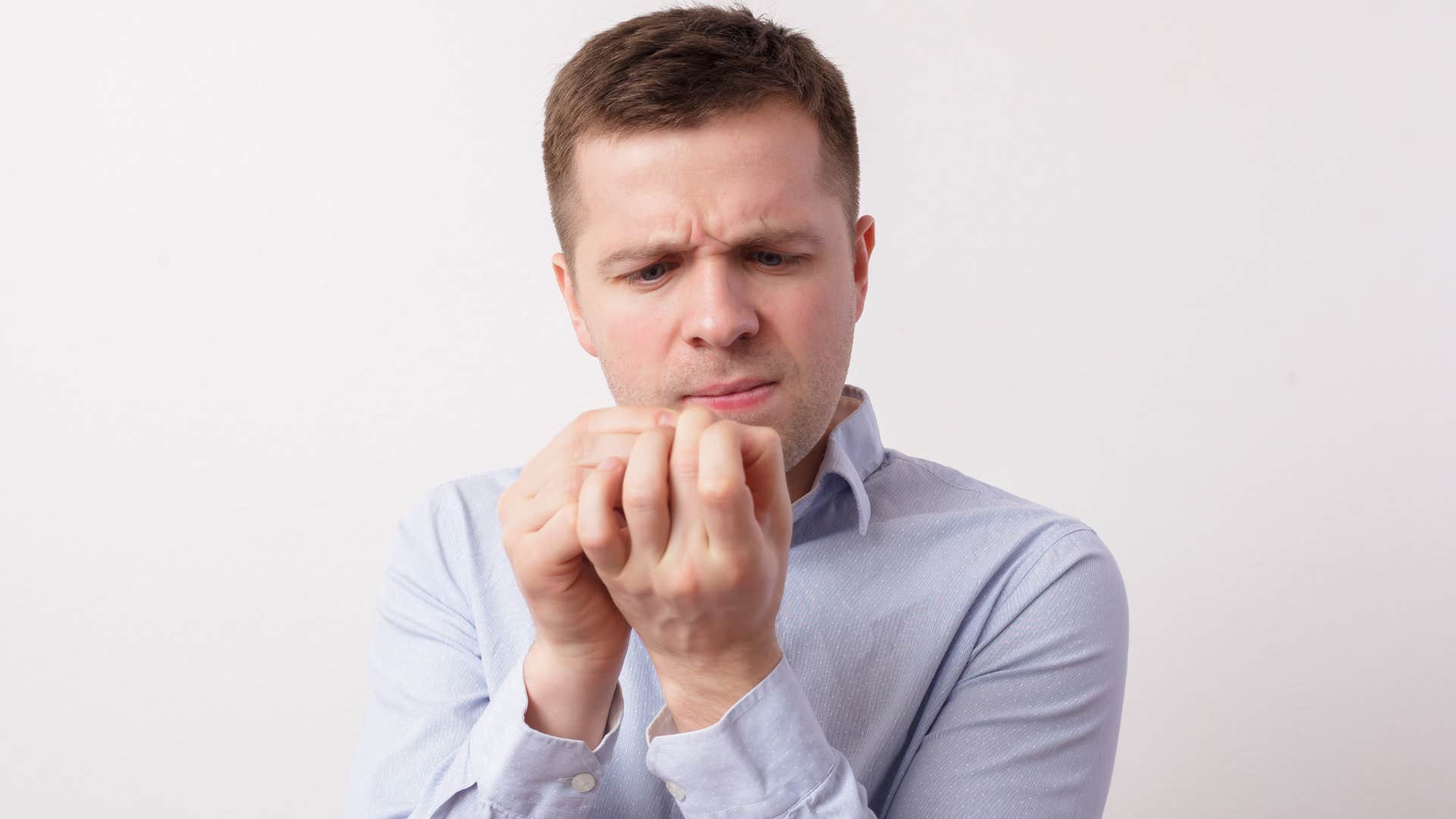 man who has horizontal ridges on his fingernails as first warning of diabetes