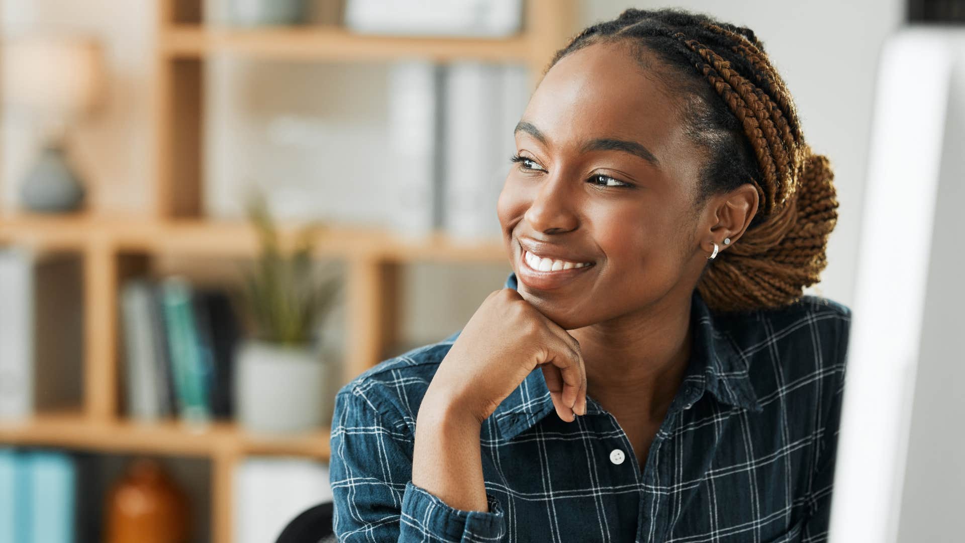 confident woman smiling at work
