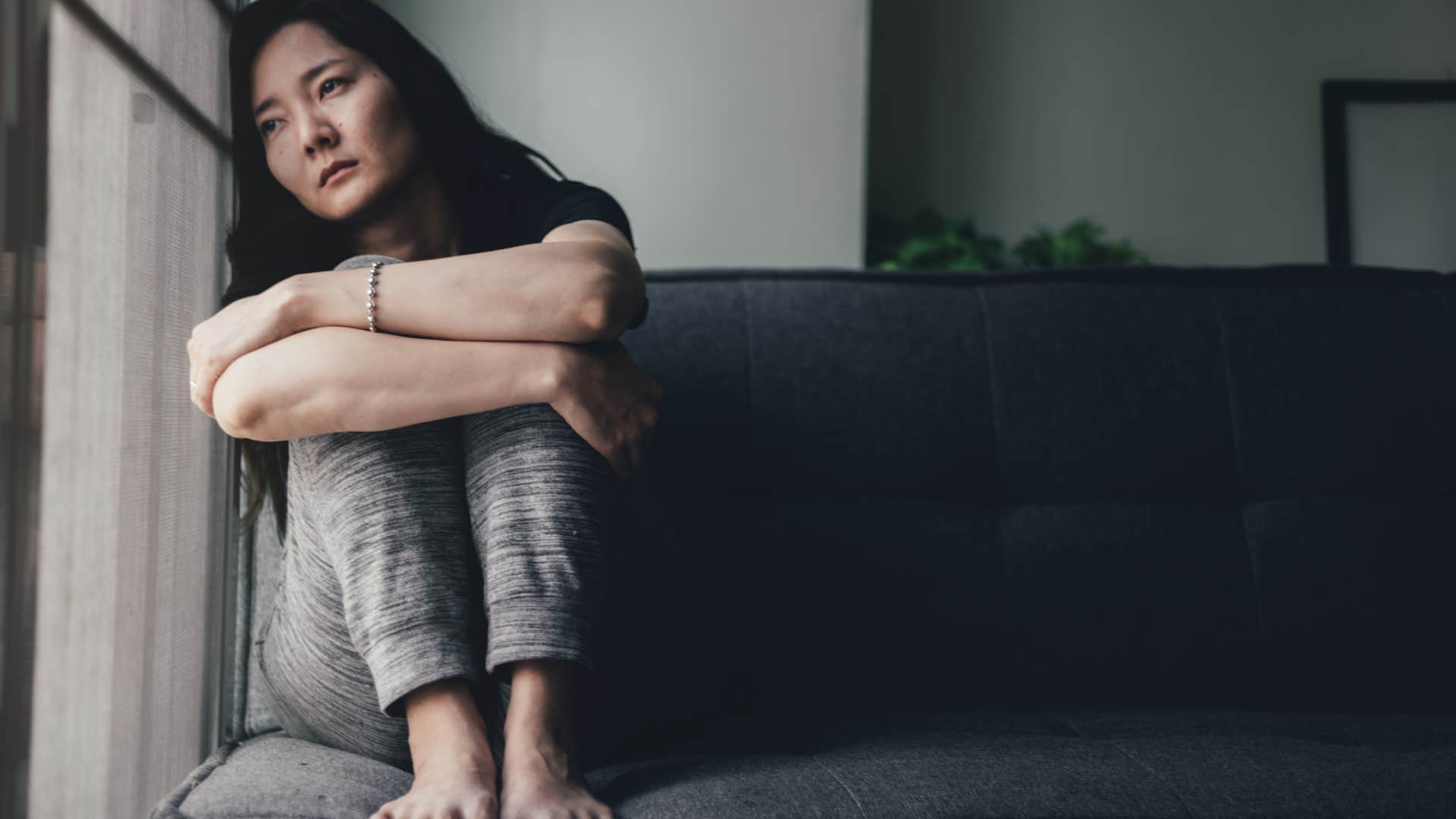 woman exhausted but refusing to rest