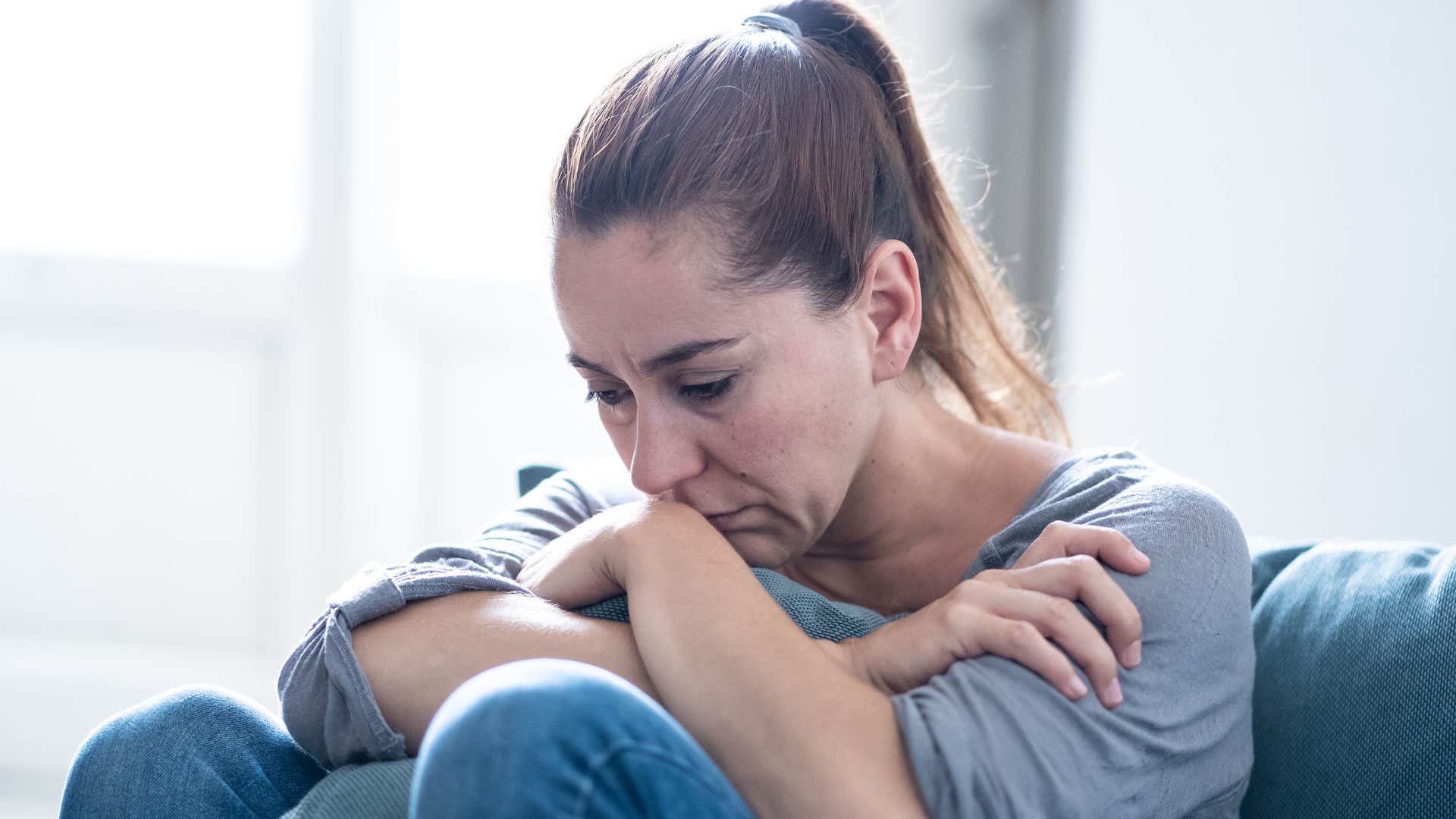 upset woman no longer dreaming about future