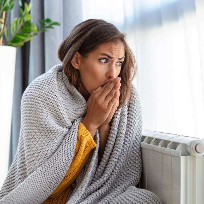 woman cold because of thermostat that affects her relationship
