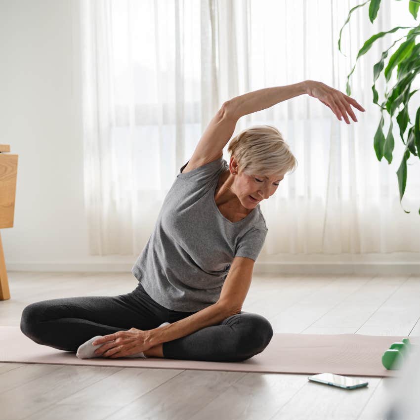woman stretching as vacation for her brain