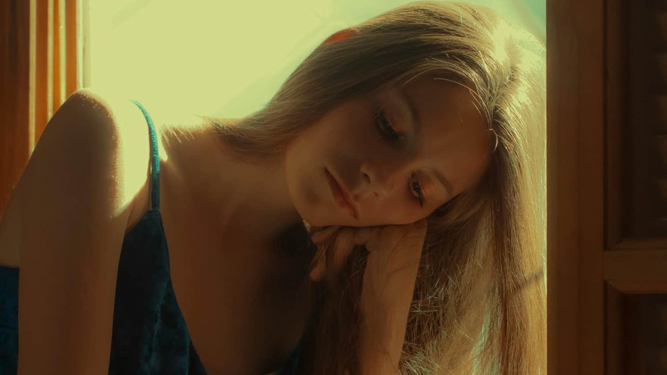 People With These Personality Traits Are More At Risk For Mental Health Issues Woman with the personality traits that make her at risk for mental health issues