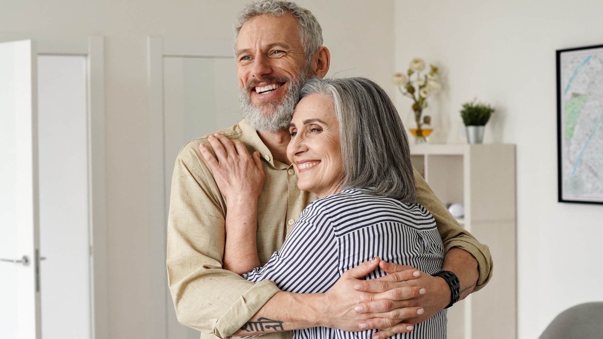 man hugging his wife receiving emotional support