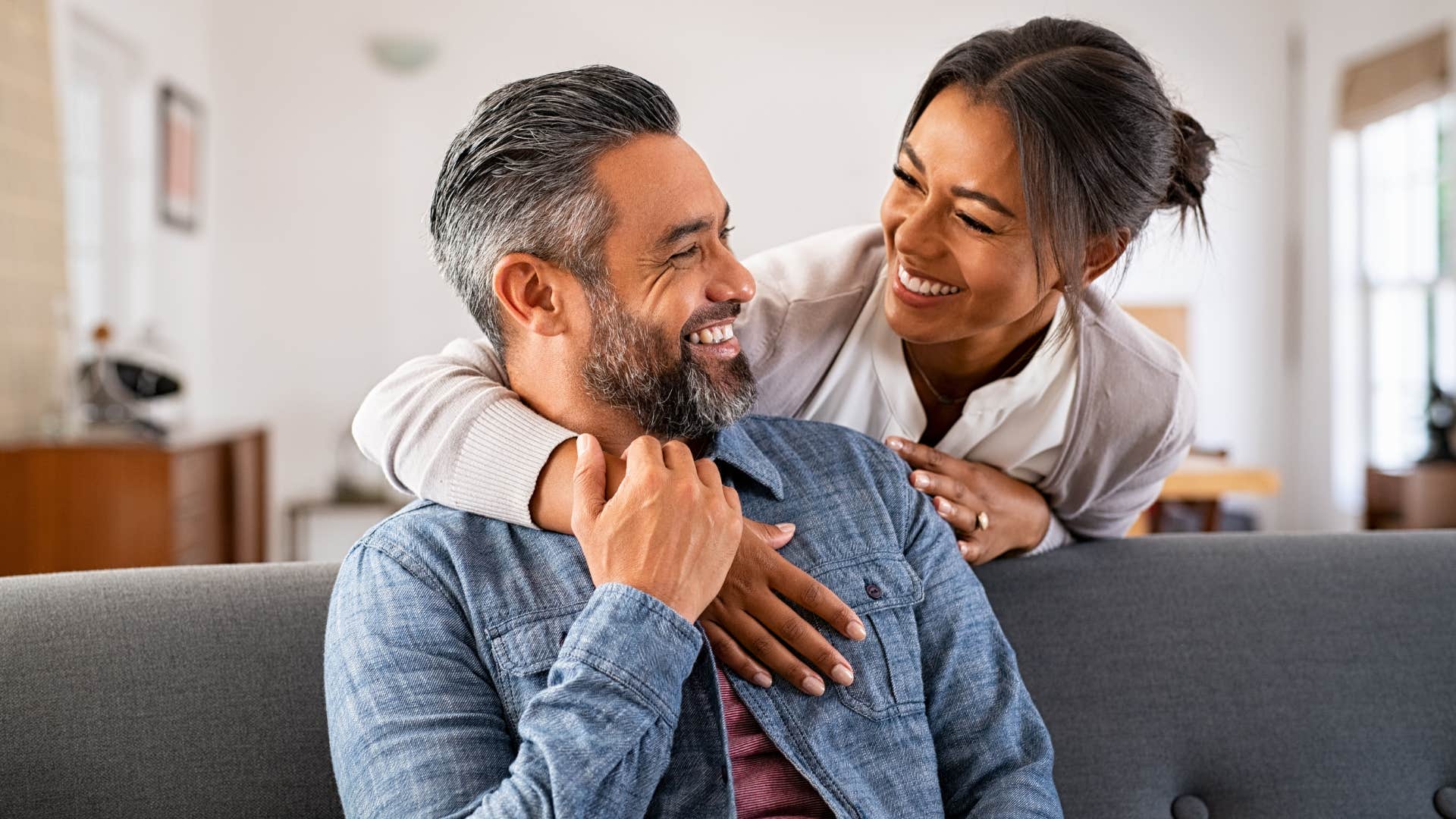woman respecting her husband hugging him