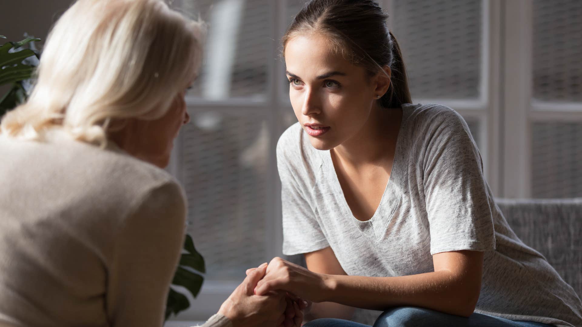 adult daughter listening to mom talk about her appearance