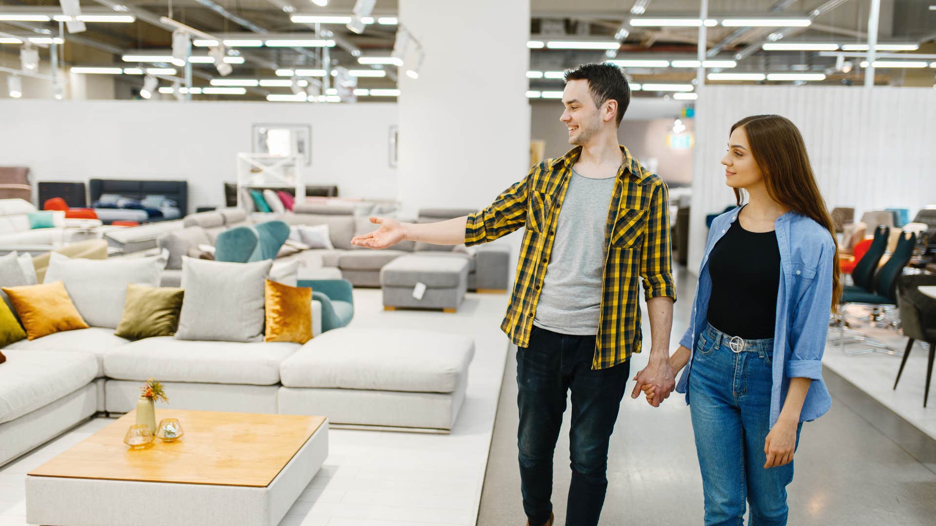 couple stocking up on furniture before shelves go empty