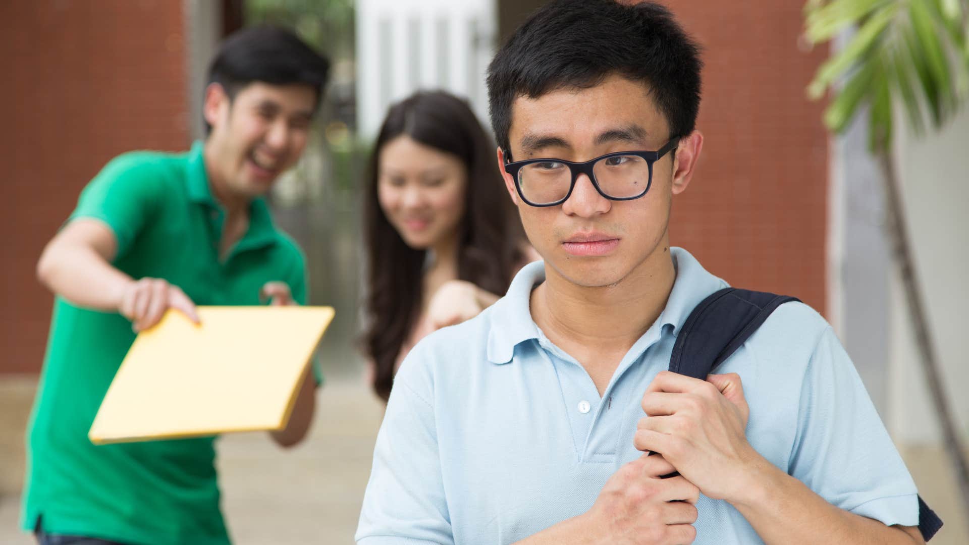 a young teenager tries to stay away from judgmental people at his school