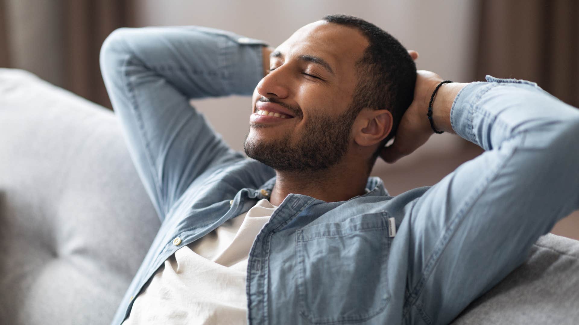 happy gen z man enjoying alone time