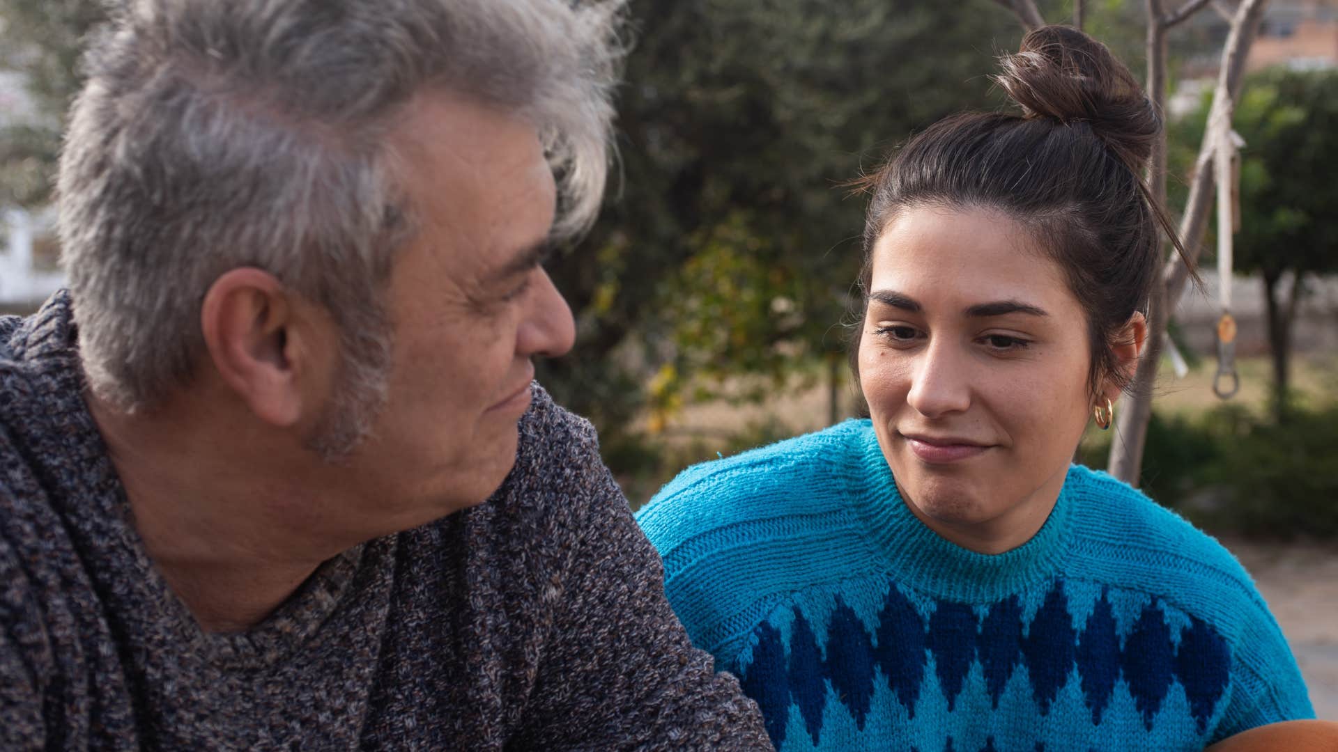 woman talking to dad about how childhood is connected to adult life