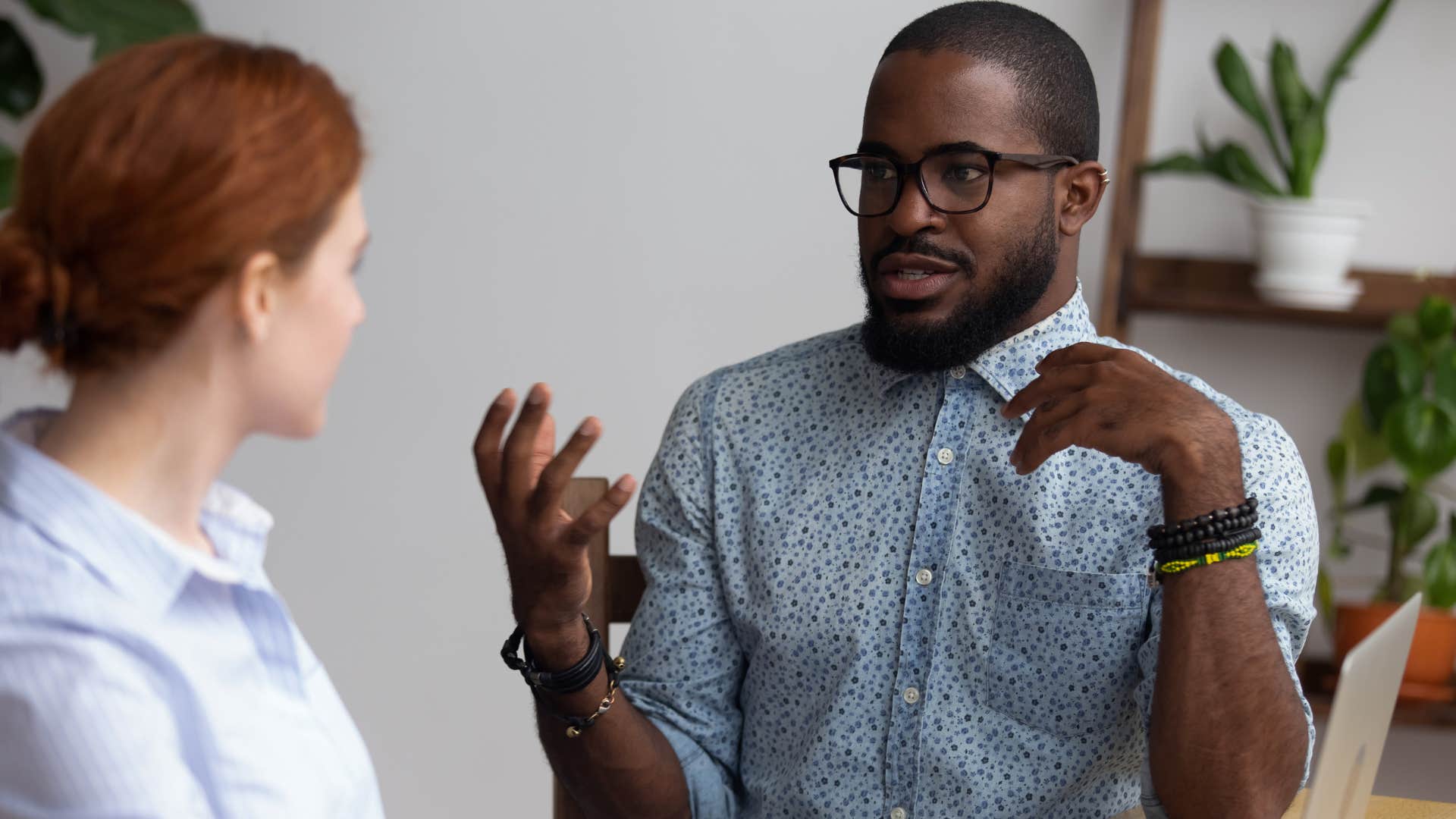 man saying nobody is entitled to anything talking to colleague