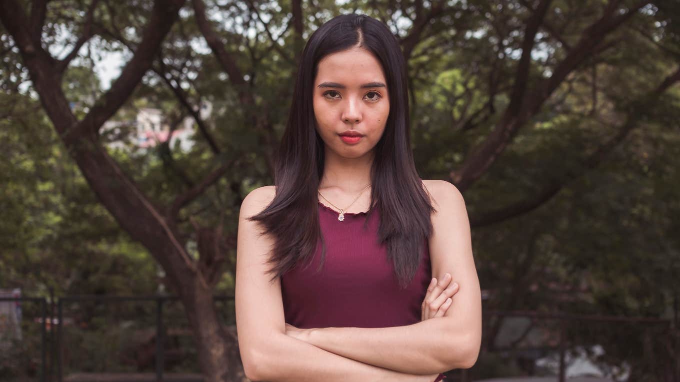 Things Gen Z Refuses To Normalize Even If It Makes Them 'Difficult' young gen z woman looking serious about her expectations