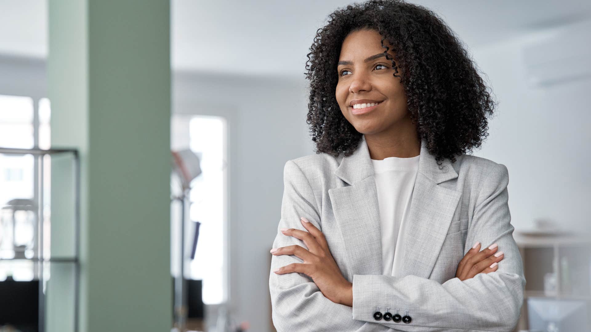 woman ignoring dress code at work wearing a suit