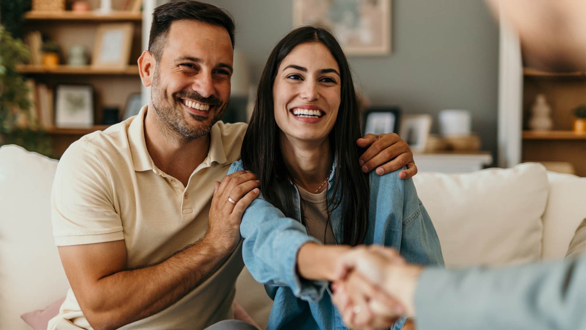 gen z couple without traditional gender roles shaking hands
