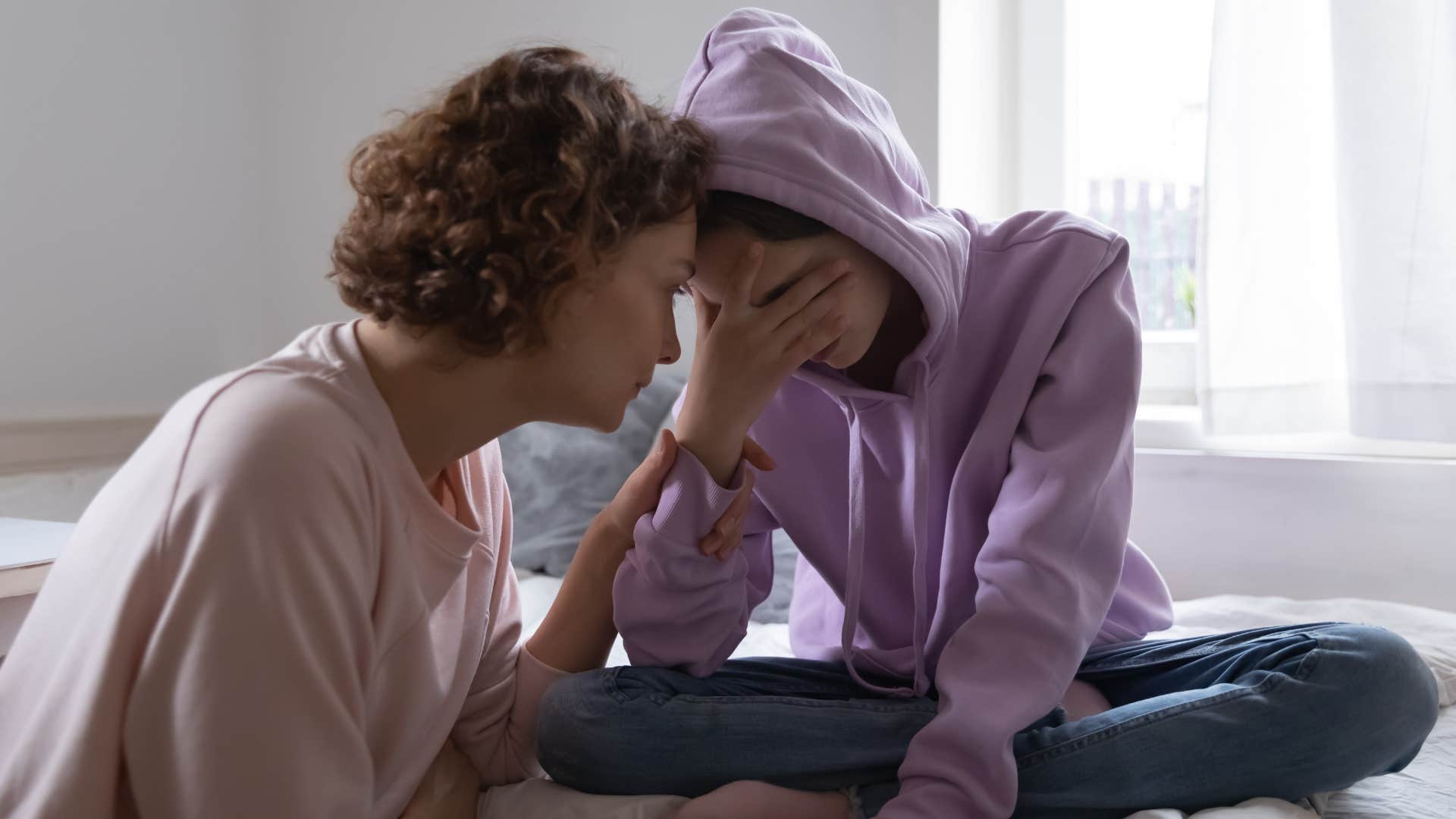 frustrated teenage girl with no privacy around her mother