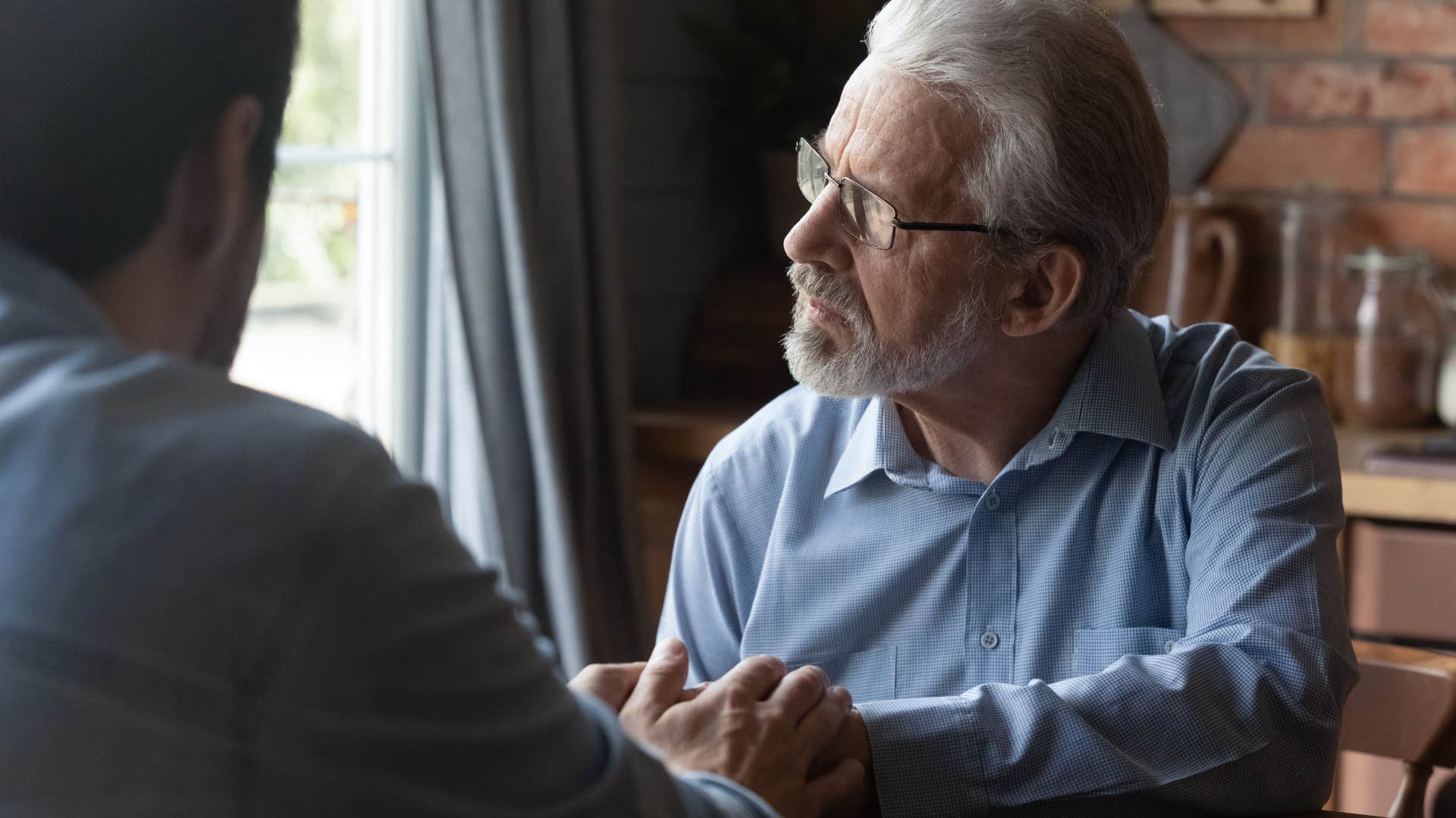 man watching his parents ignore their own mental health