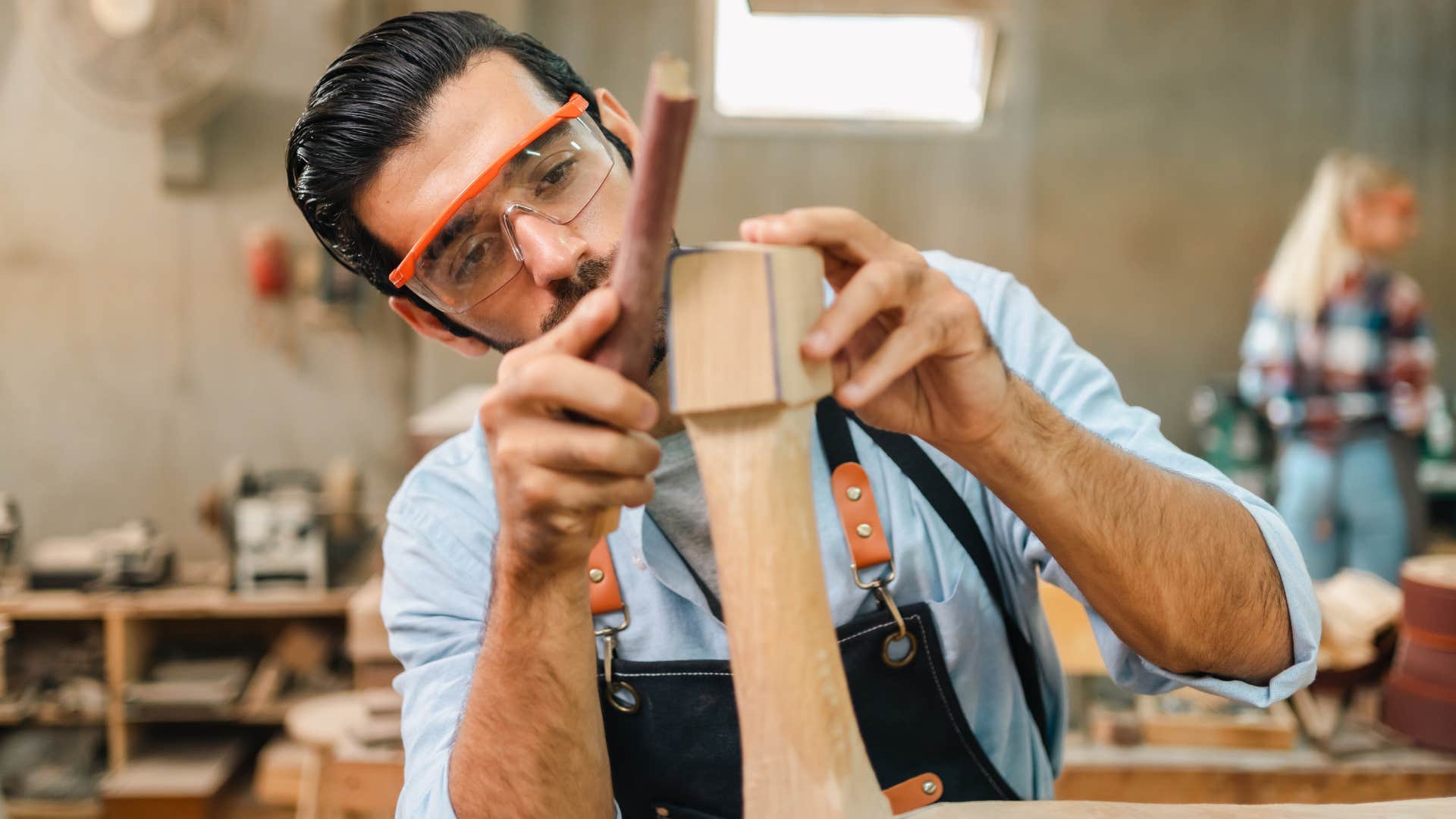 high iq man crafting a chair in a wood shop
