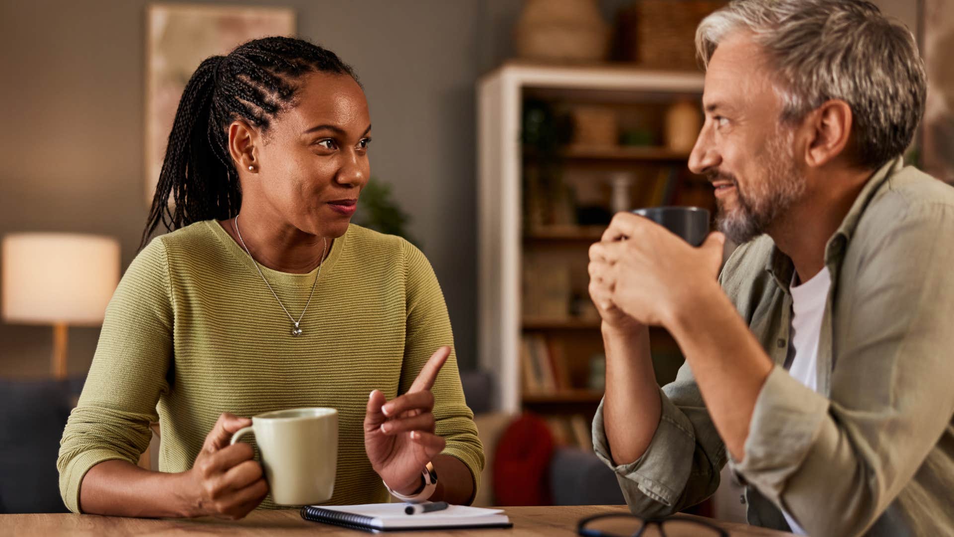 high iq couple having deep conversation at home