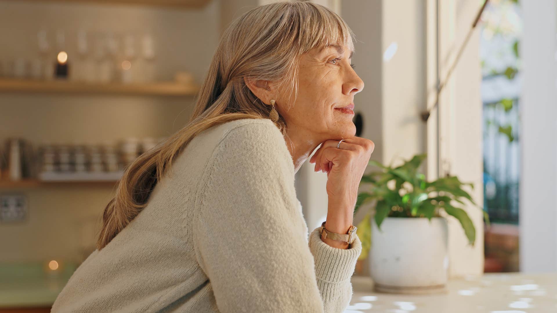 high iq woman enjoying spending time alone in her kitchen